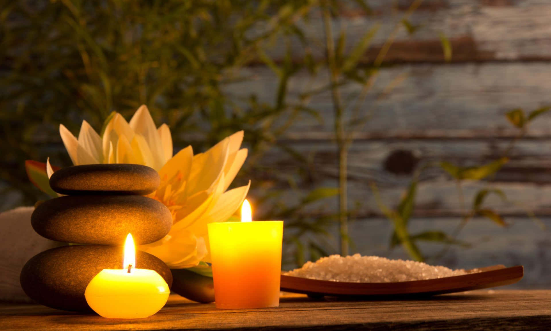 Tranquil Spa Settingwith Candlesand Stones Background