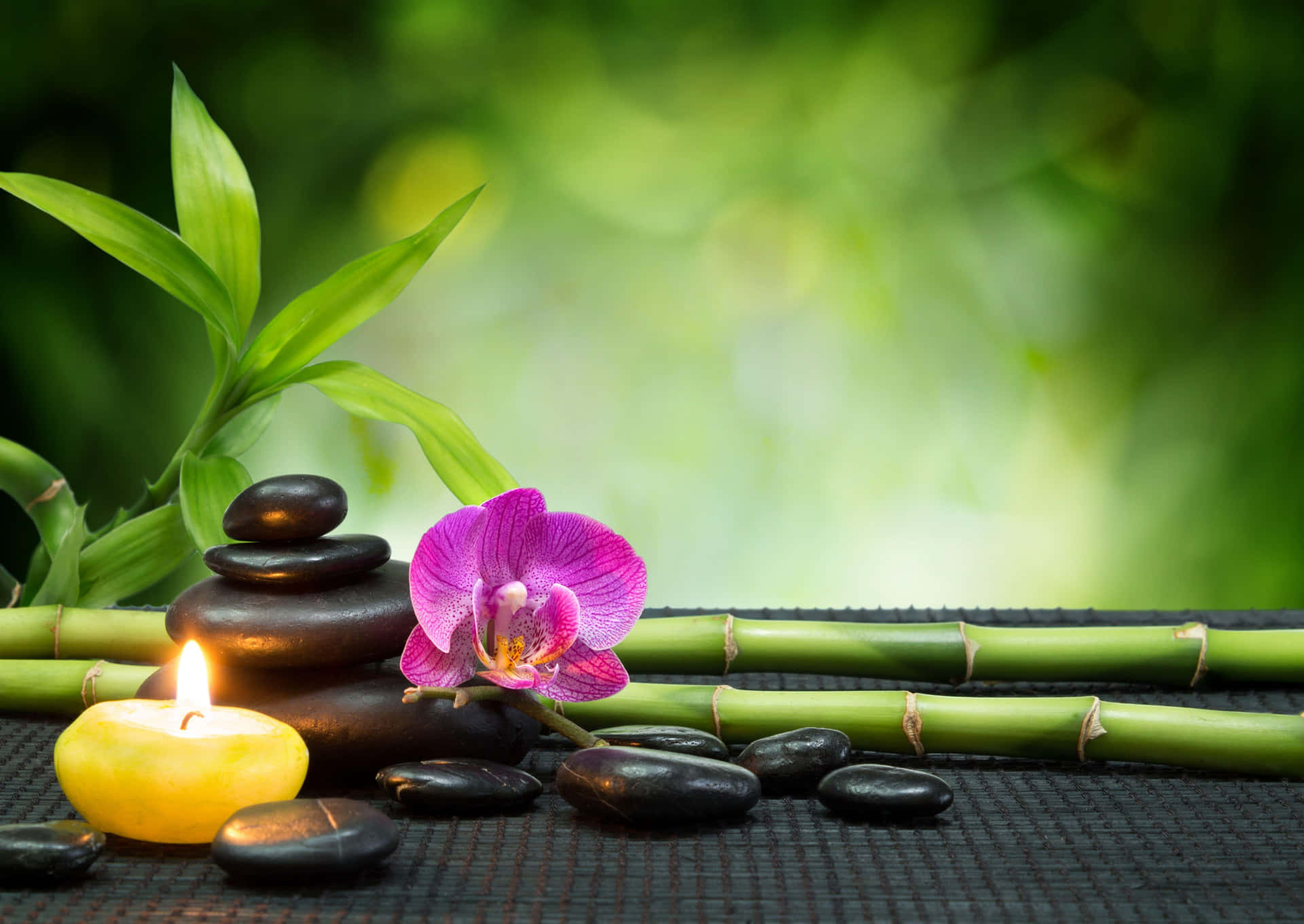 Tranquil Spa Settingwith Orchidand Candles Background