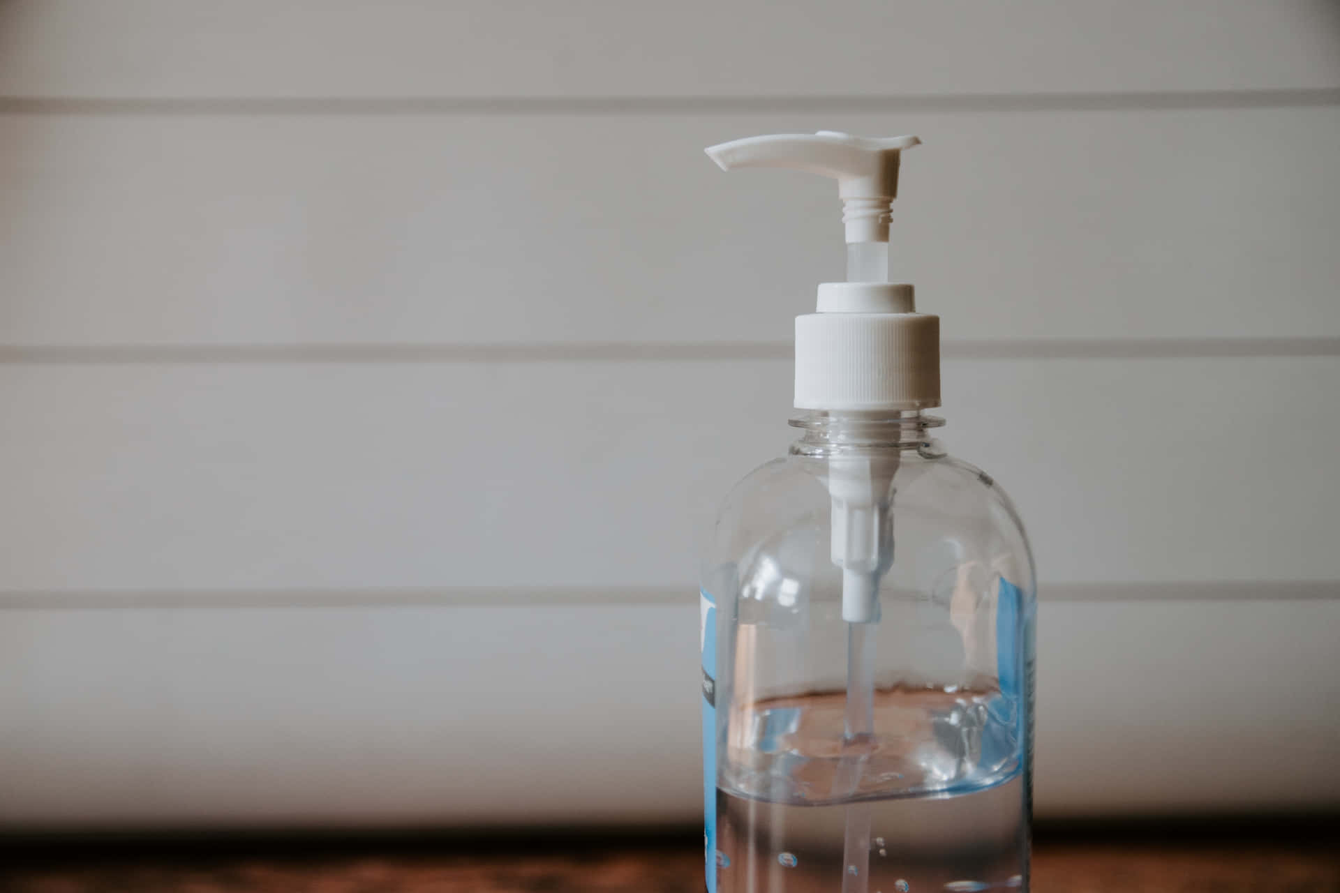 Transparent Bottle Of Antiseptic Liquid Wash Background