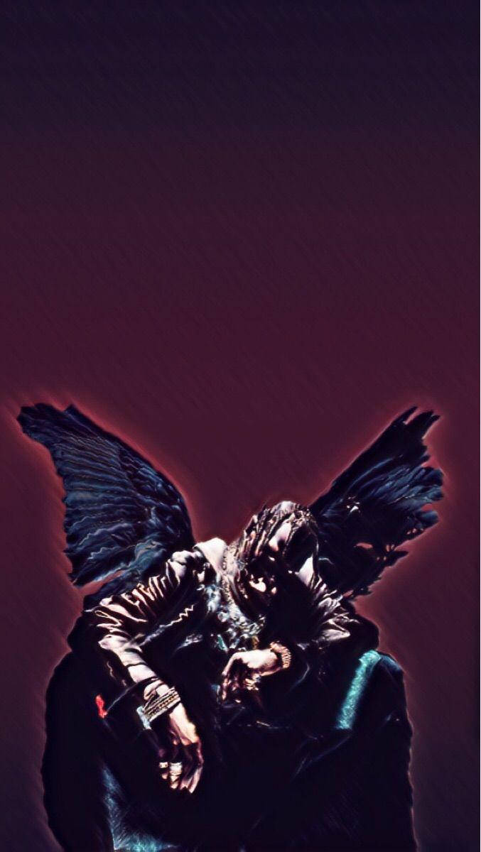 Travis Scott Astroworld Sitting With Butterfly Wings Background