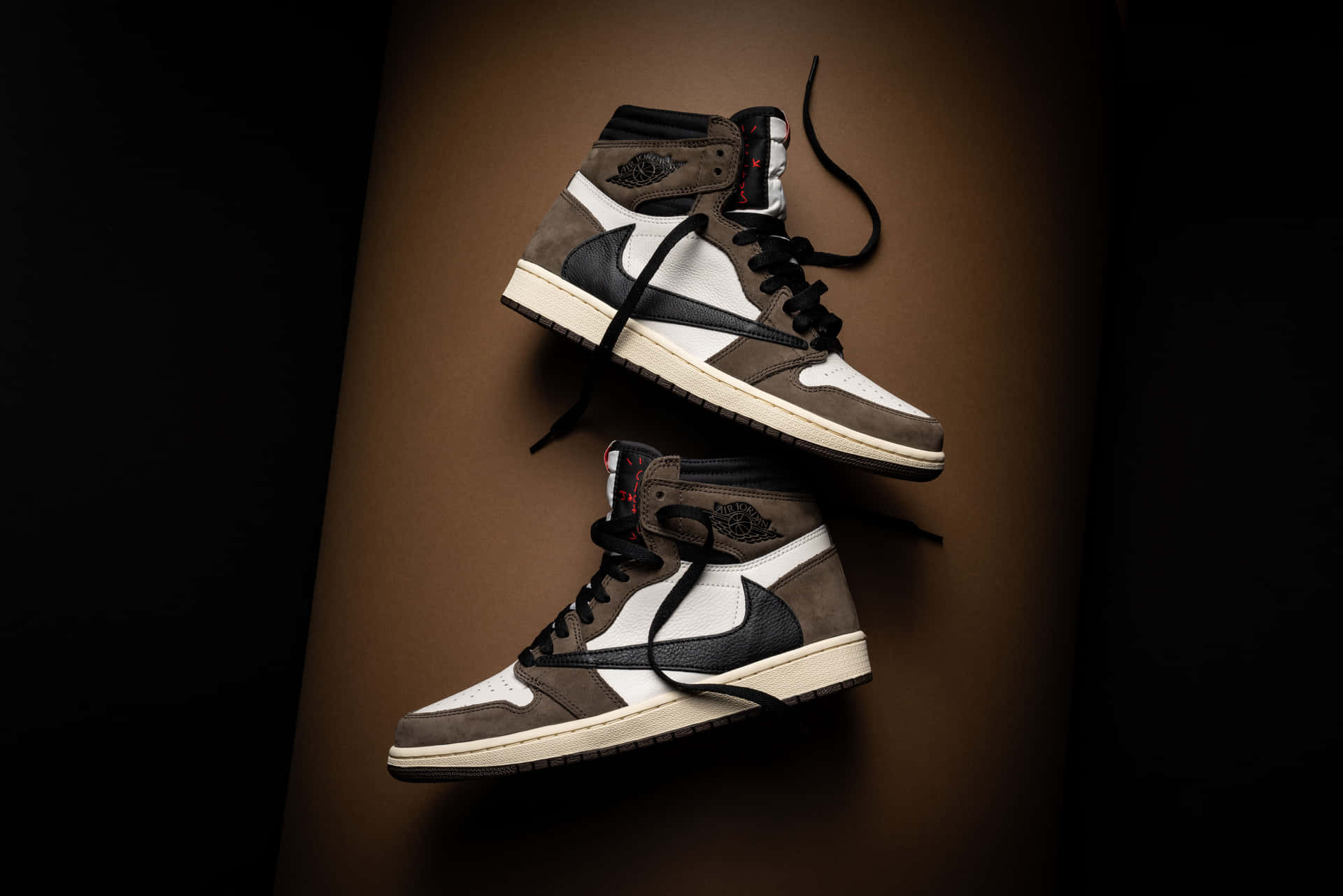 Travis Scott Wearing His Iconic Jordan 1 Sneakers. Background