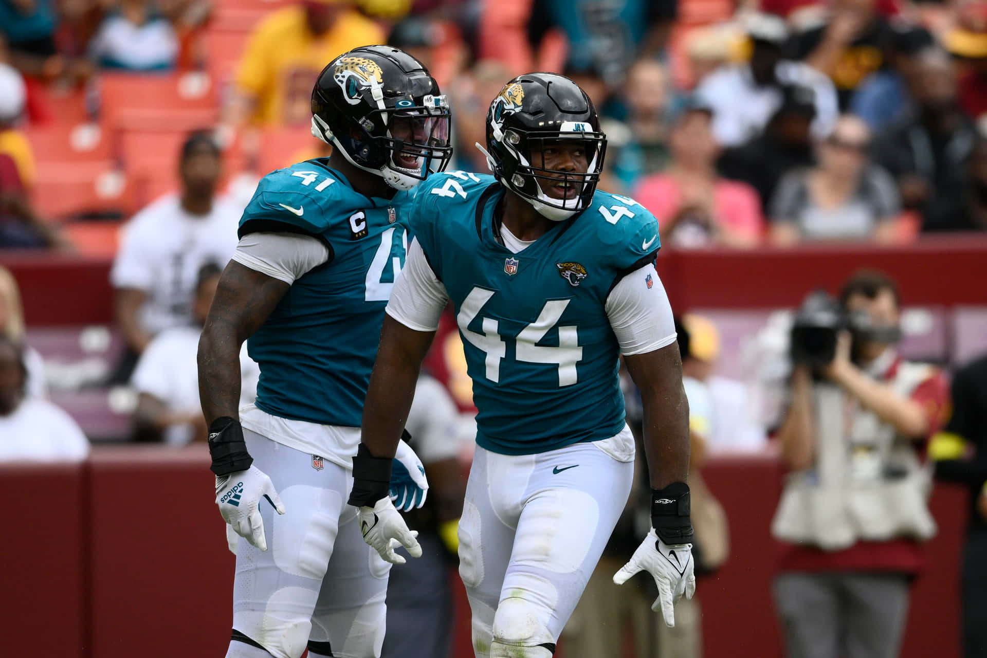 Travon Walker And Teammate Josh Allen Background