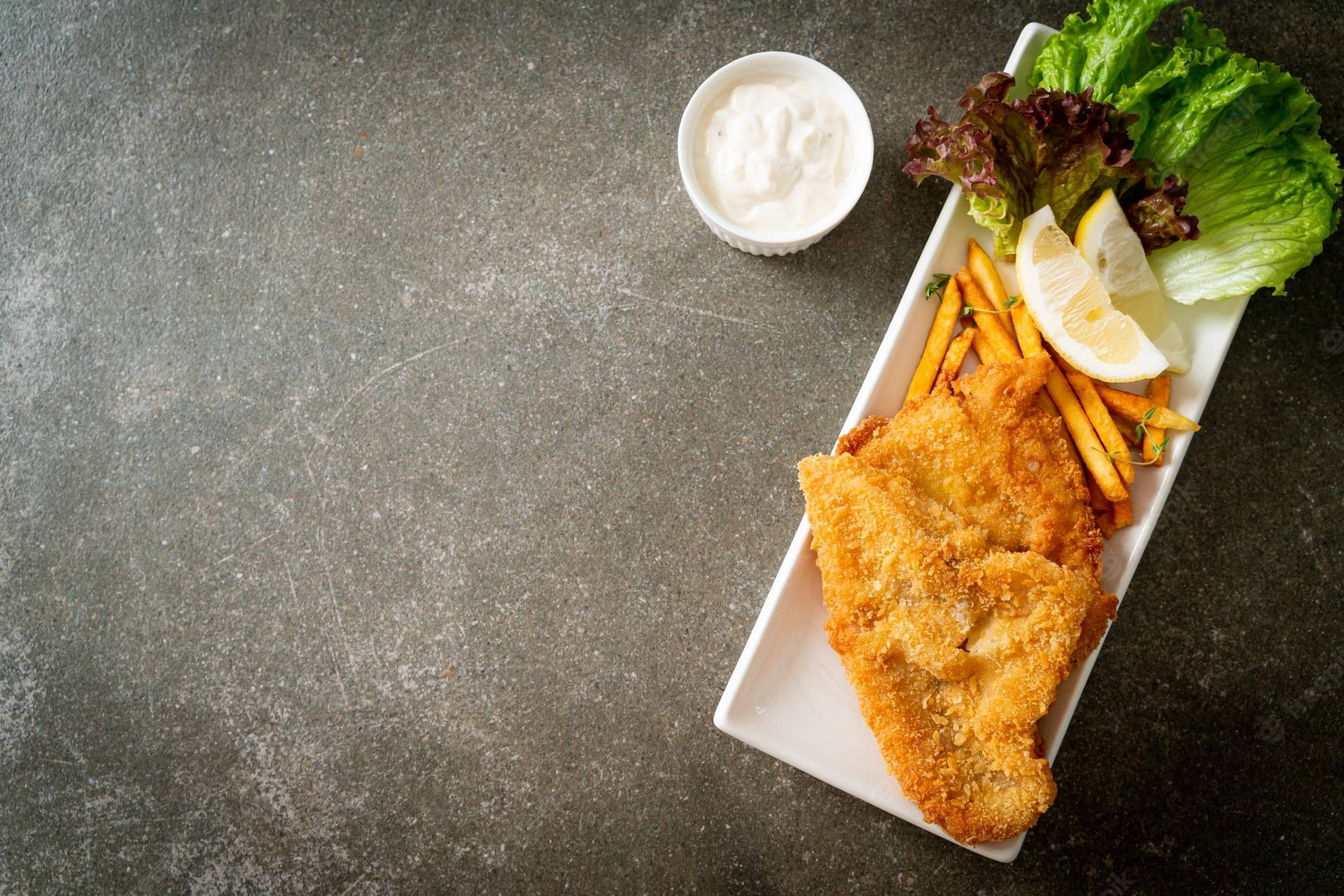 Tray Of Fish And Chips On A Counter