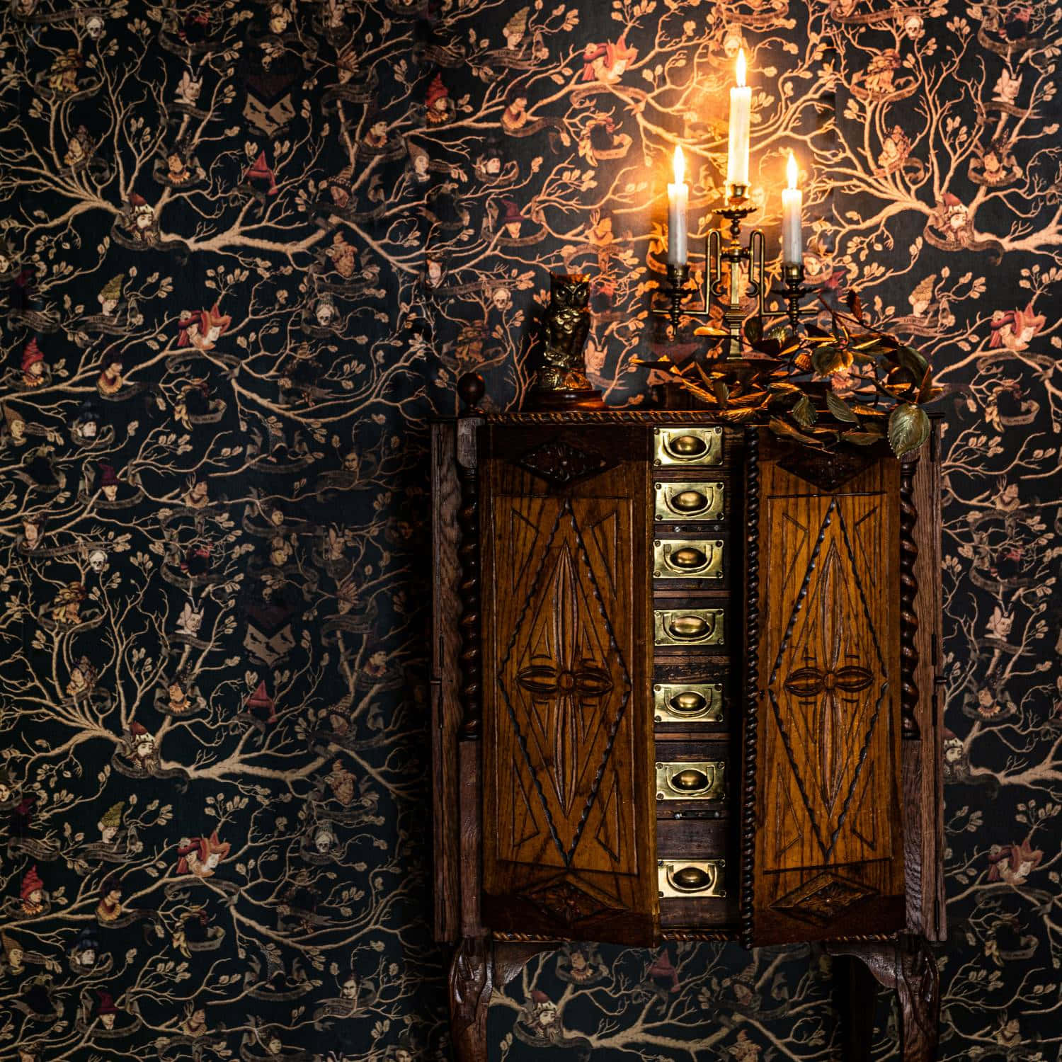 Tree Branches On Wall With Candlelight Background