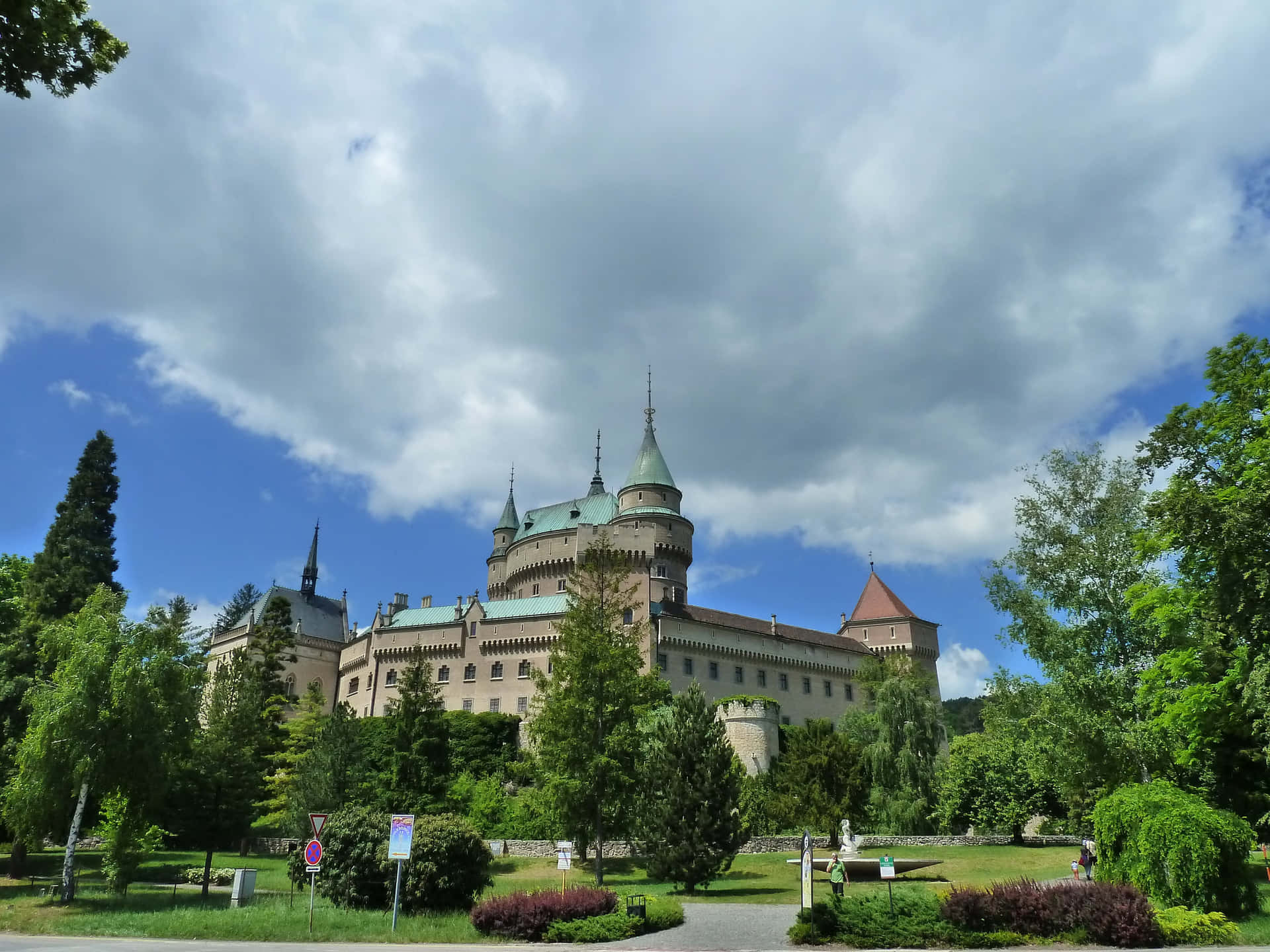 Trees And Greenery Around Bojnice Castle Background