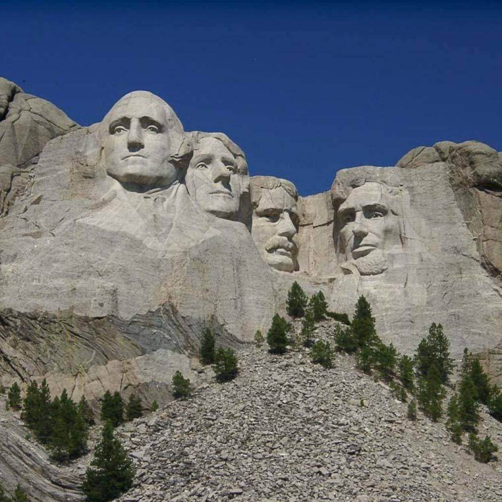 Trees And Rocks Around Mount Rushmore Background