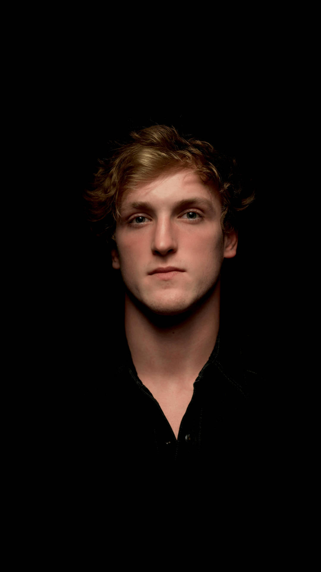 Trendsetter Logan Paul In Bold Red Jacket Background