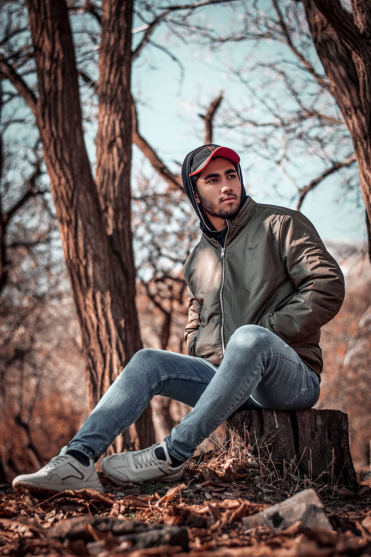 Trendy Man In The Woods Background