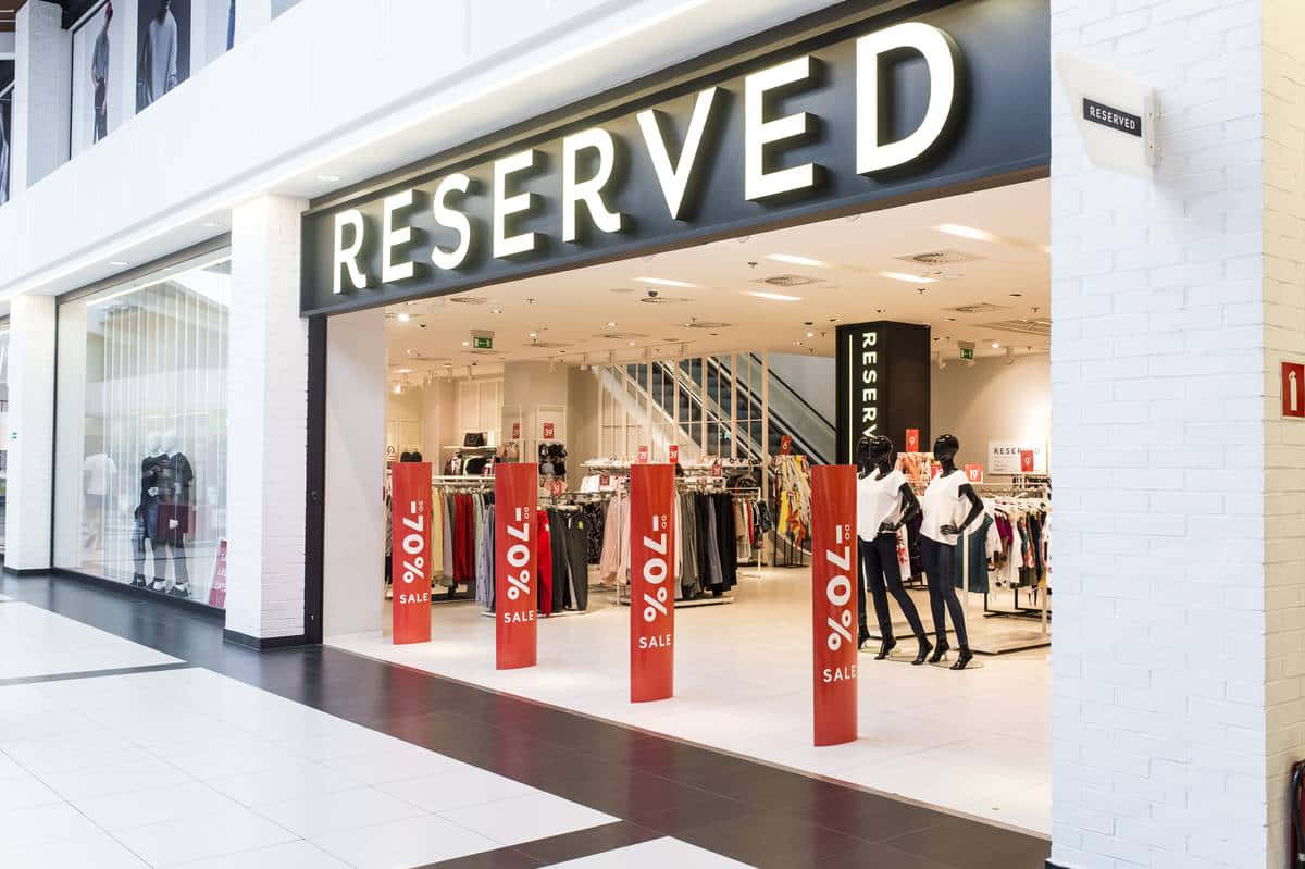 Trendy Reserved Apparel On Display For Sale Background