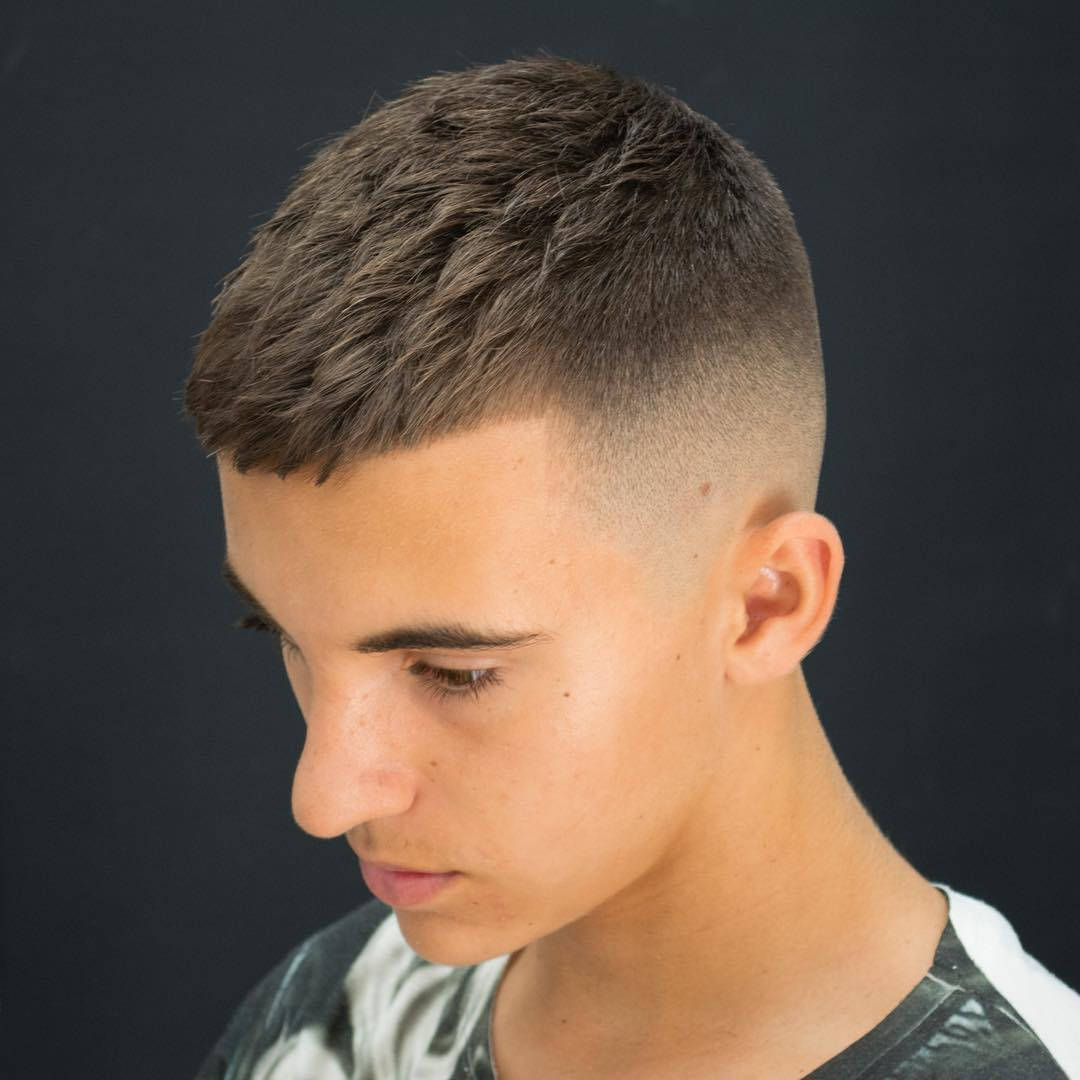 Trendy Short Fade Men's Hairstyle.