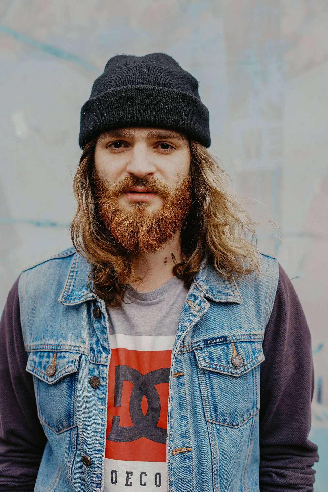 Trendy Style For Long-haired Men With Blonde Beards Background