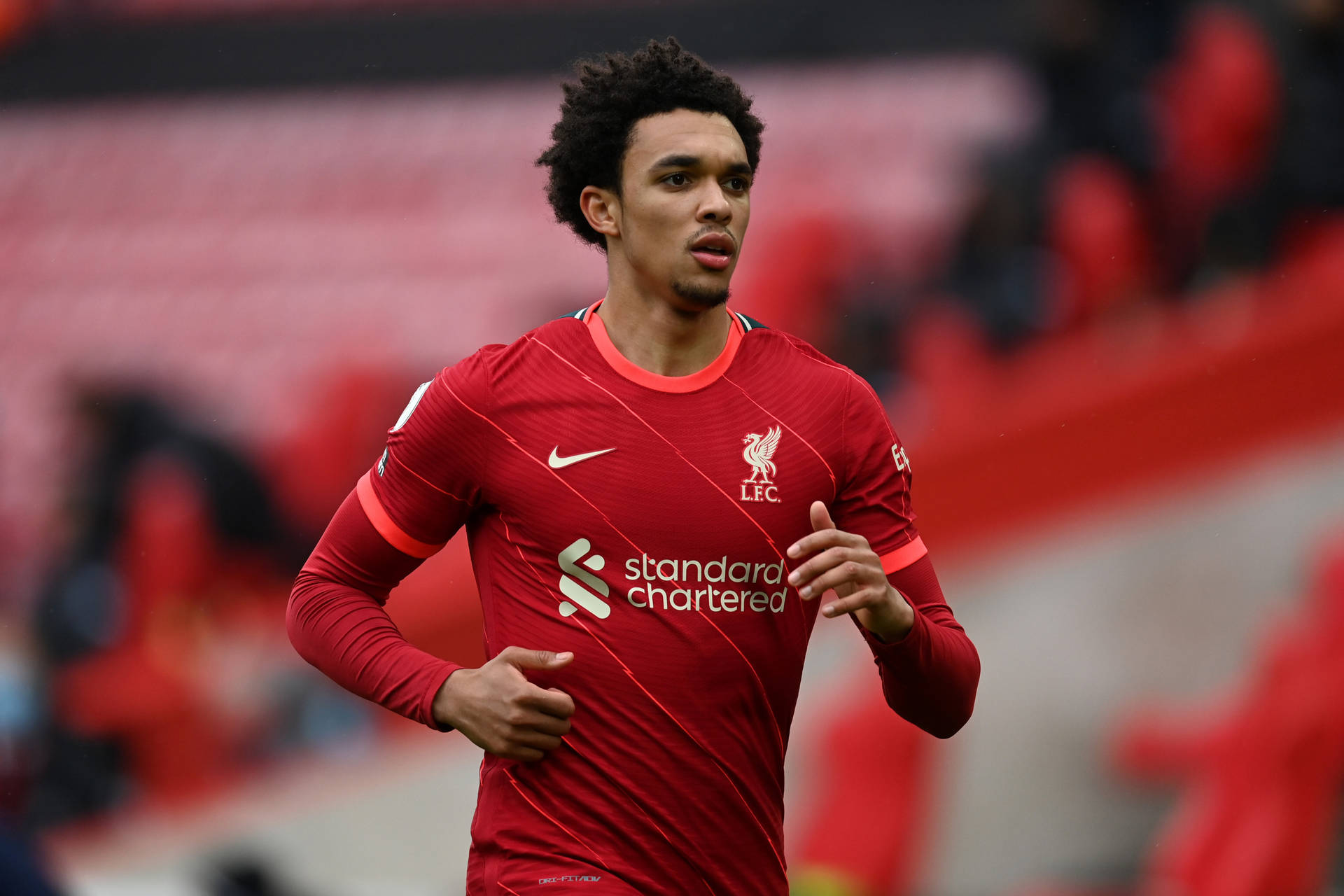 Trent Alexander-arnold Running Blurry Background Background