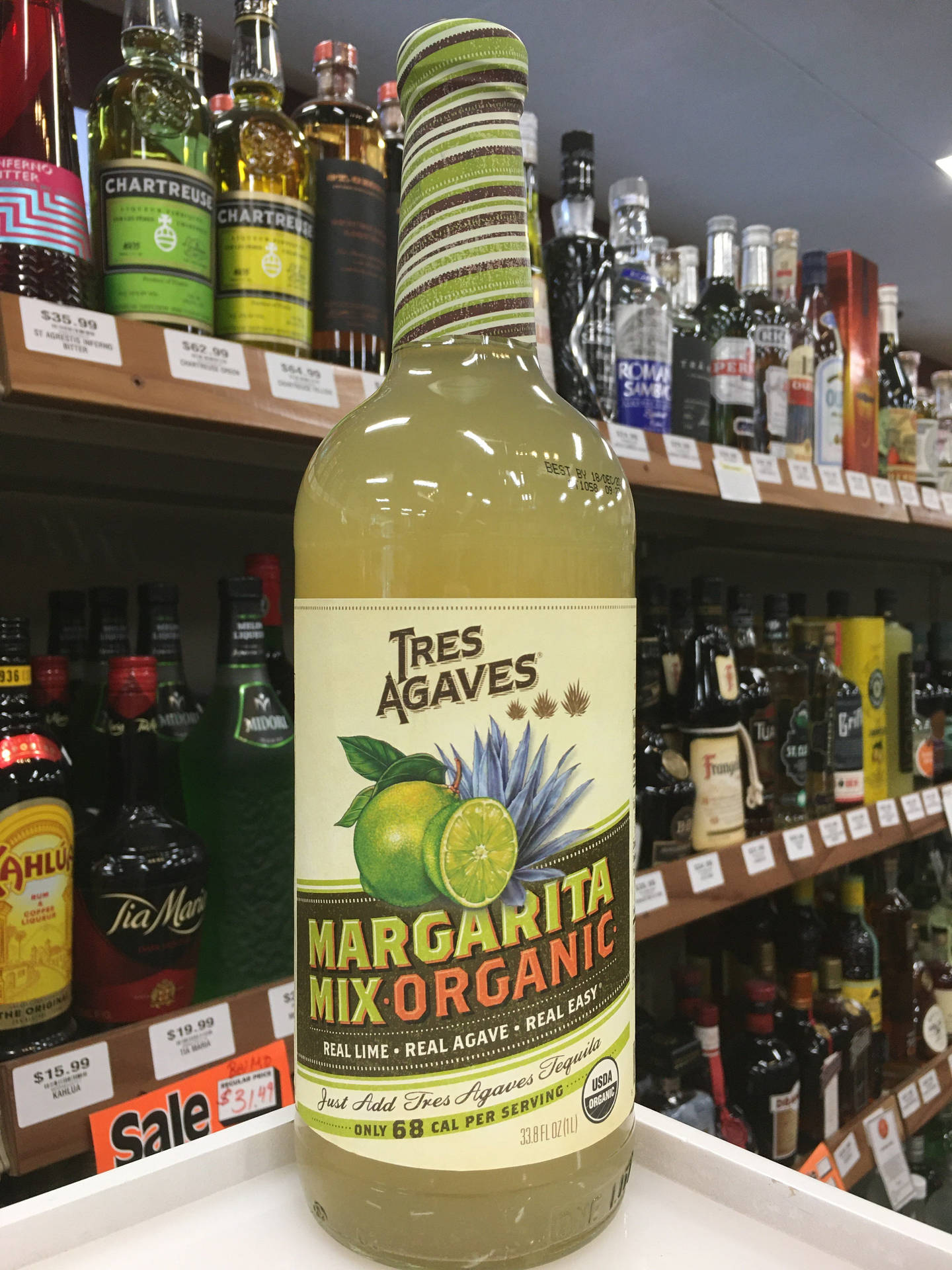 Tres Agaves Organic Margarita Mix In Vibrant Yellow Background