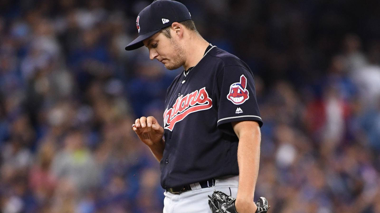 Trevor Bauer Checking His Nails Background