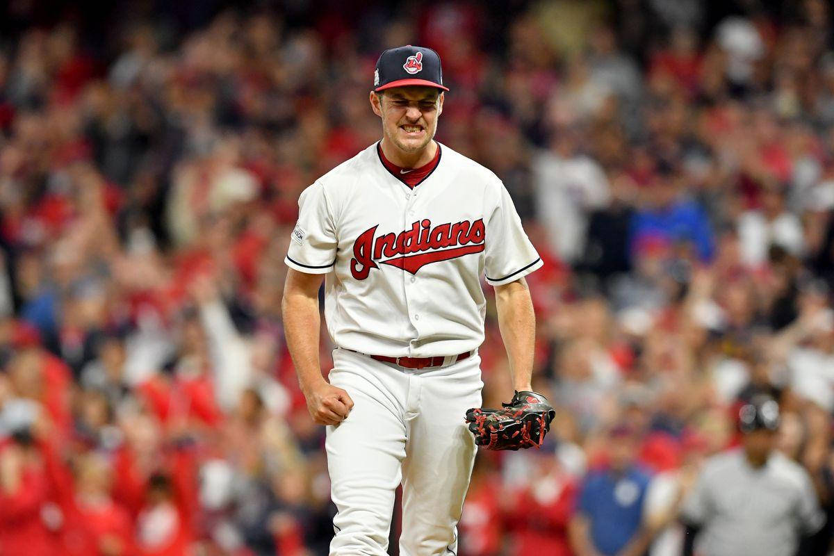 Trevor Bauer Gritting Teeth In Front Of Crowd Background