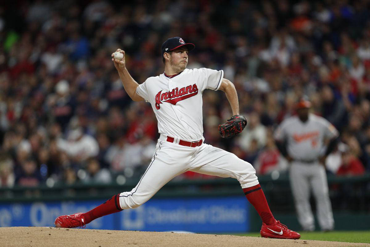 Trevor Bauer Leaning Forward To Pitch Background