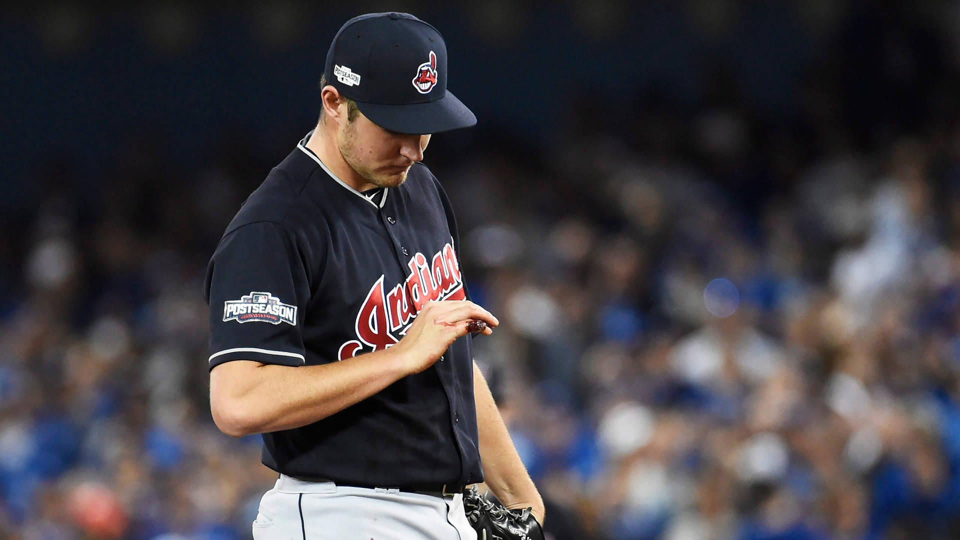 Trevor Bauer Looking At His Hand Background