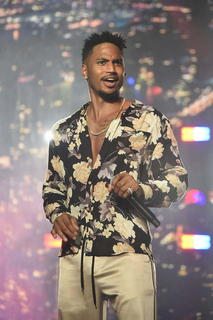 Trey Songz Captivates Fans With His Mesmerizing Performance Background