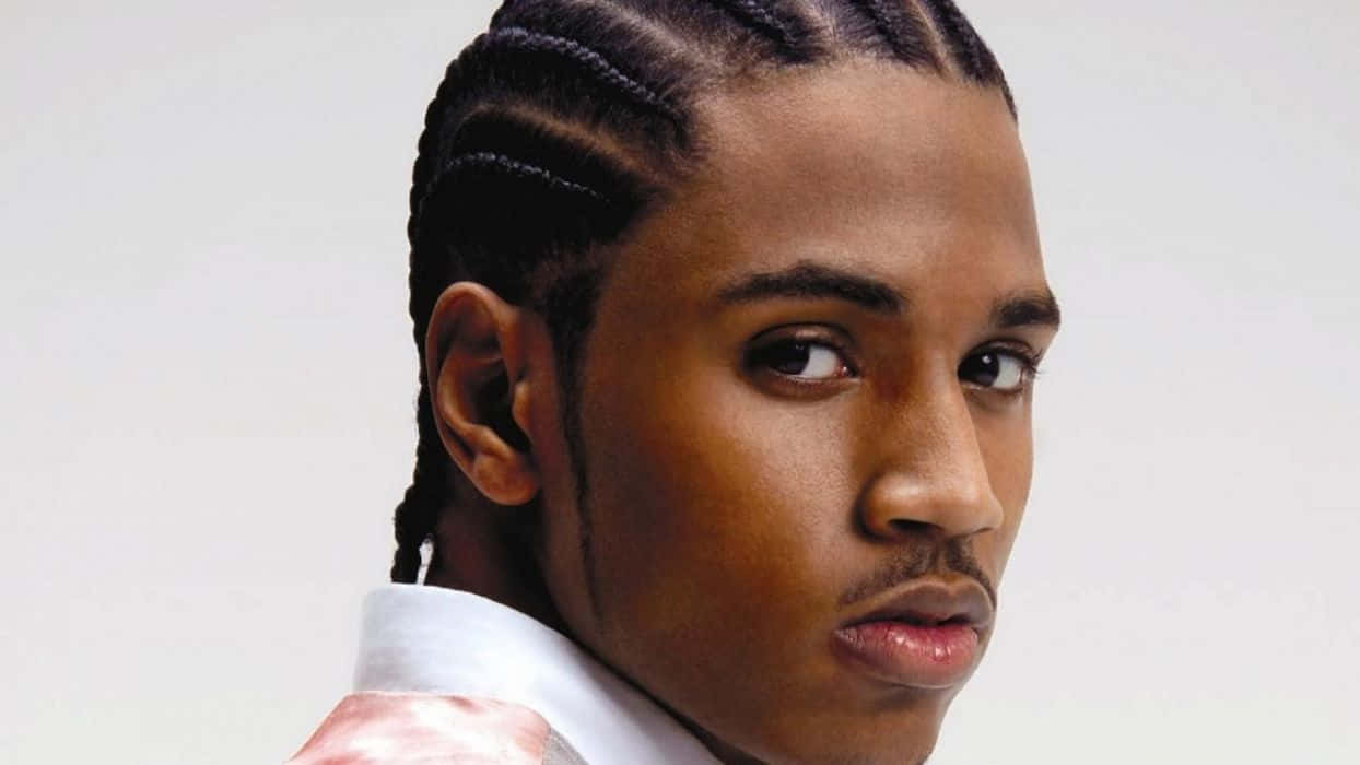 Trey Songz Shines Onstage At An Electrifying Concert Performance Background