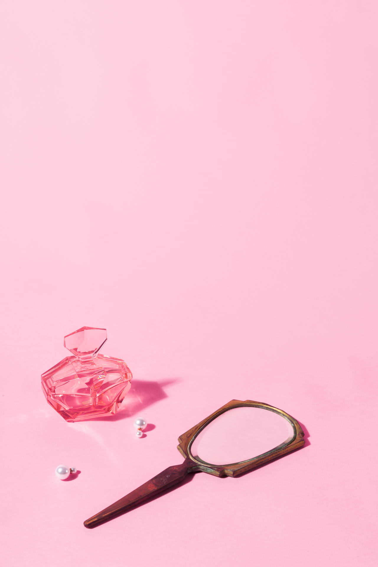 Trinkets On Pastel Pink Color Table Background