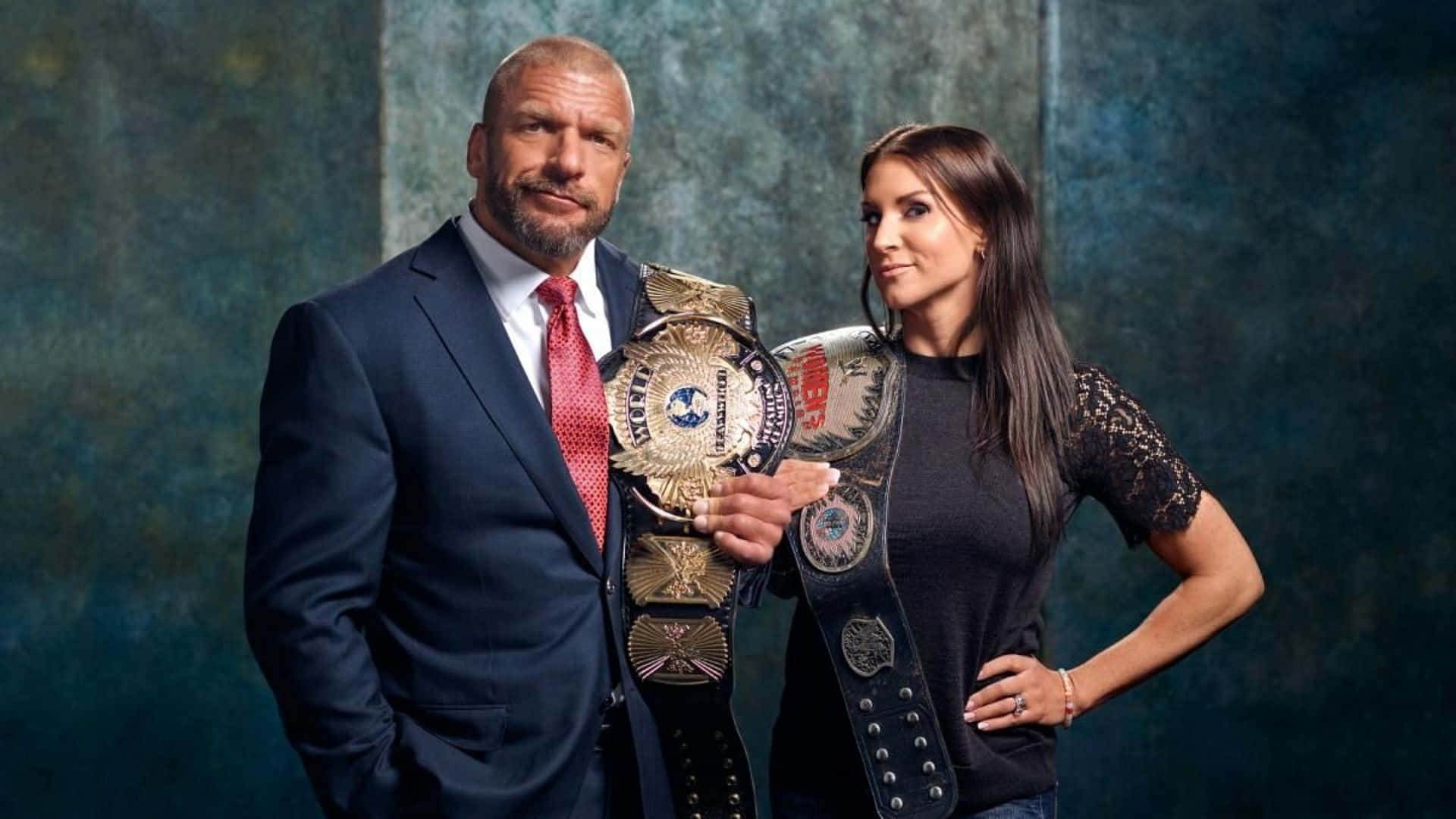 Triple H With Wife Stephanie Mcmahon Levesque