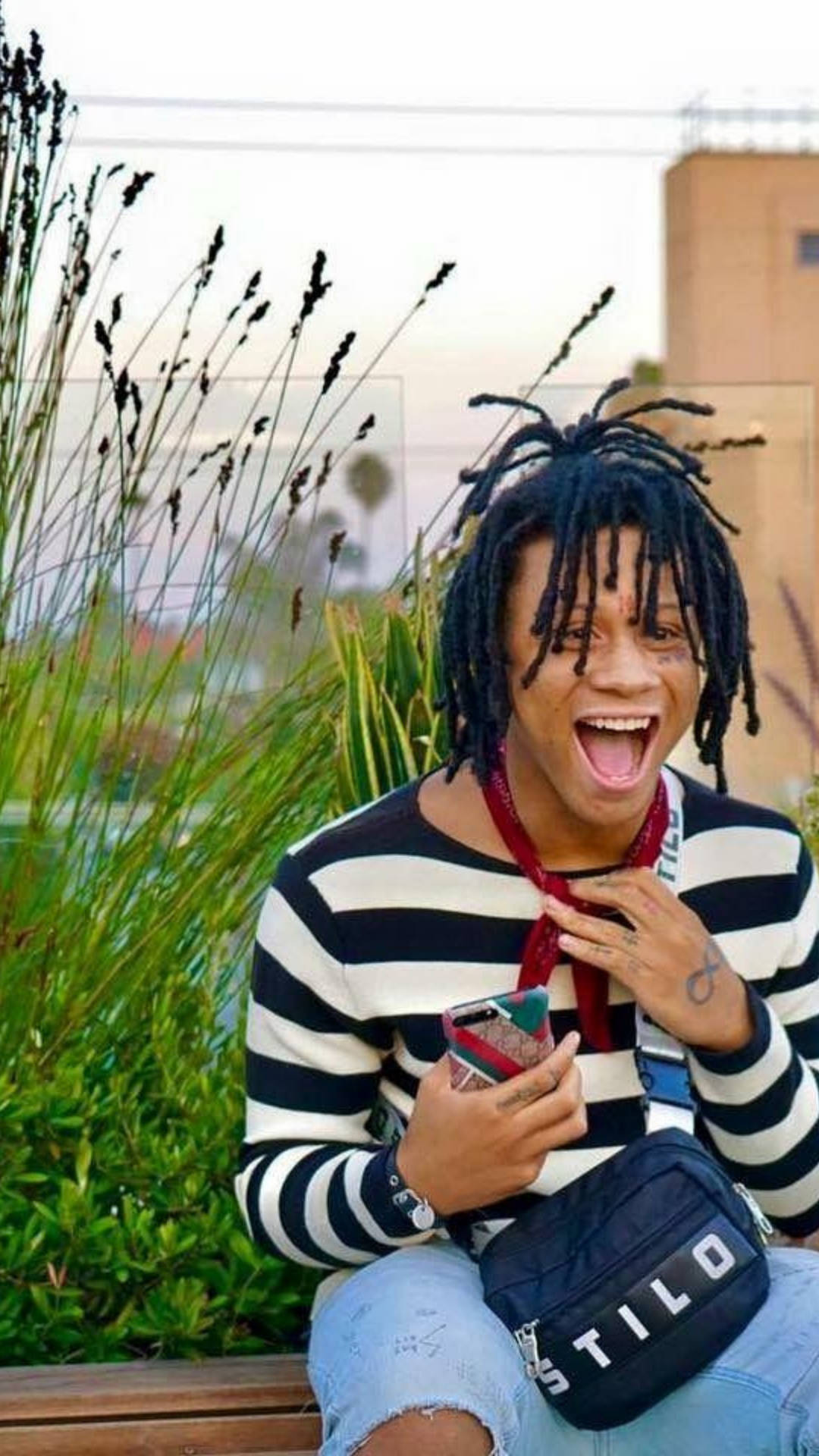 Trippie Redd In Stripes Background