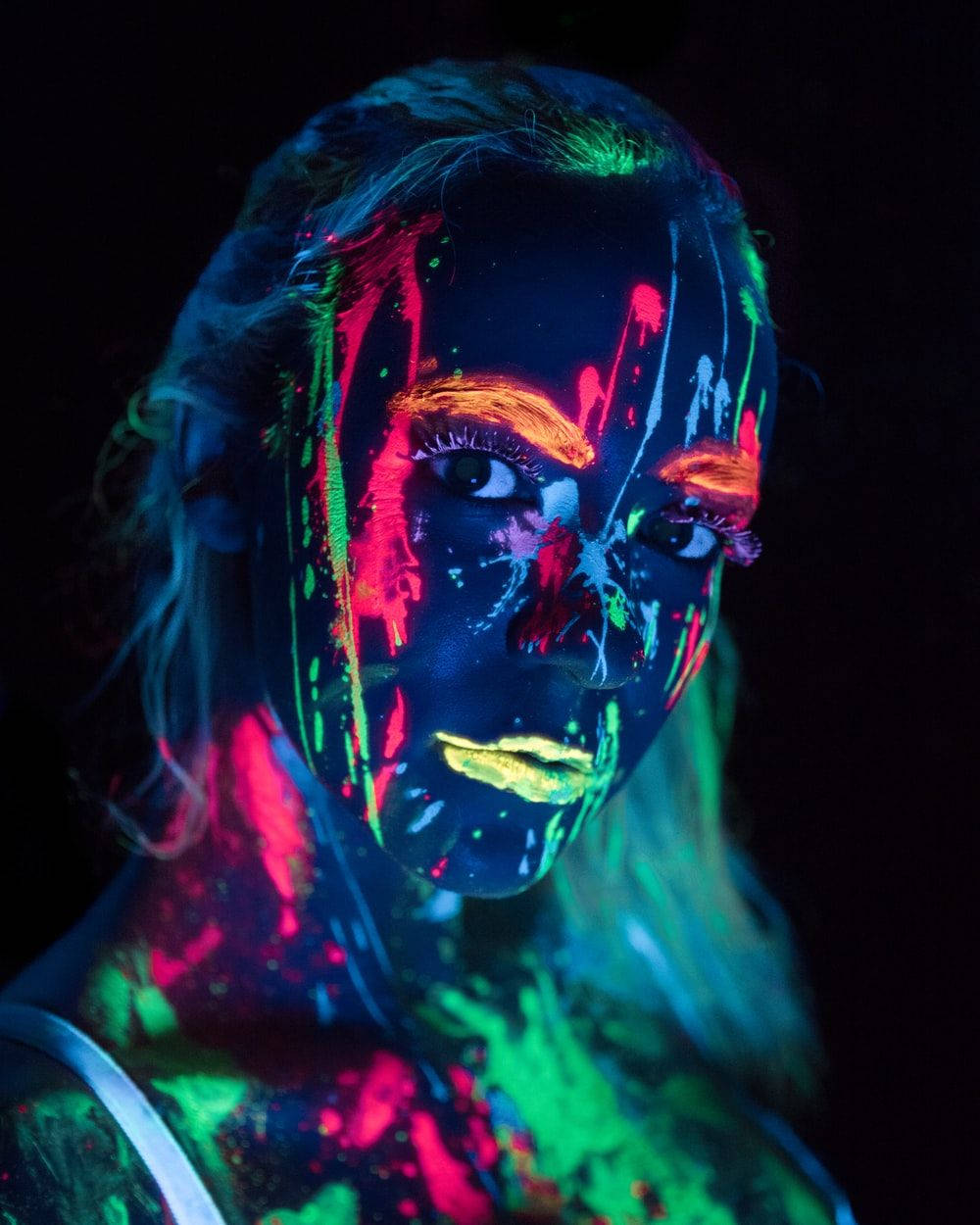 Trippy Dark Girl With Neon Paint Background