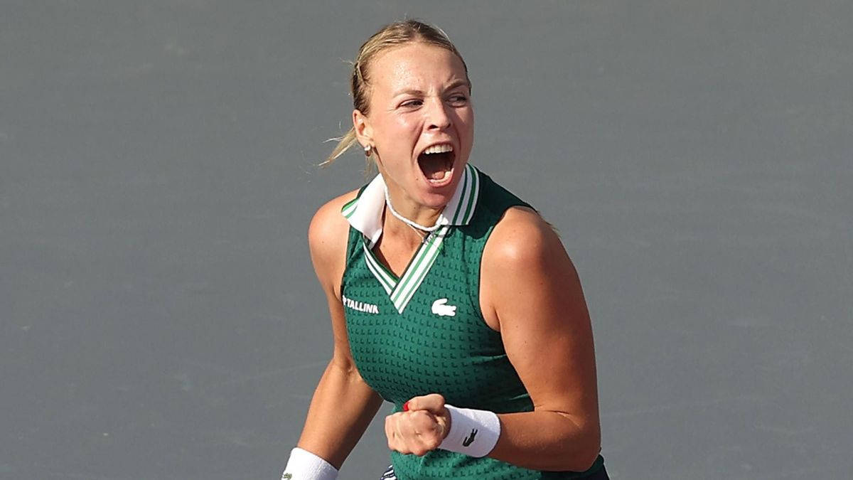 Triumph Moment Of Anett Kontaveit In Green Background