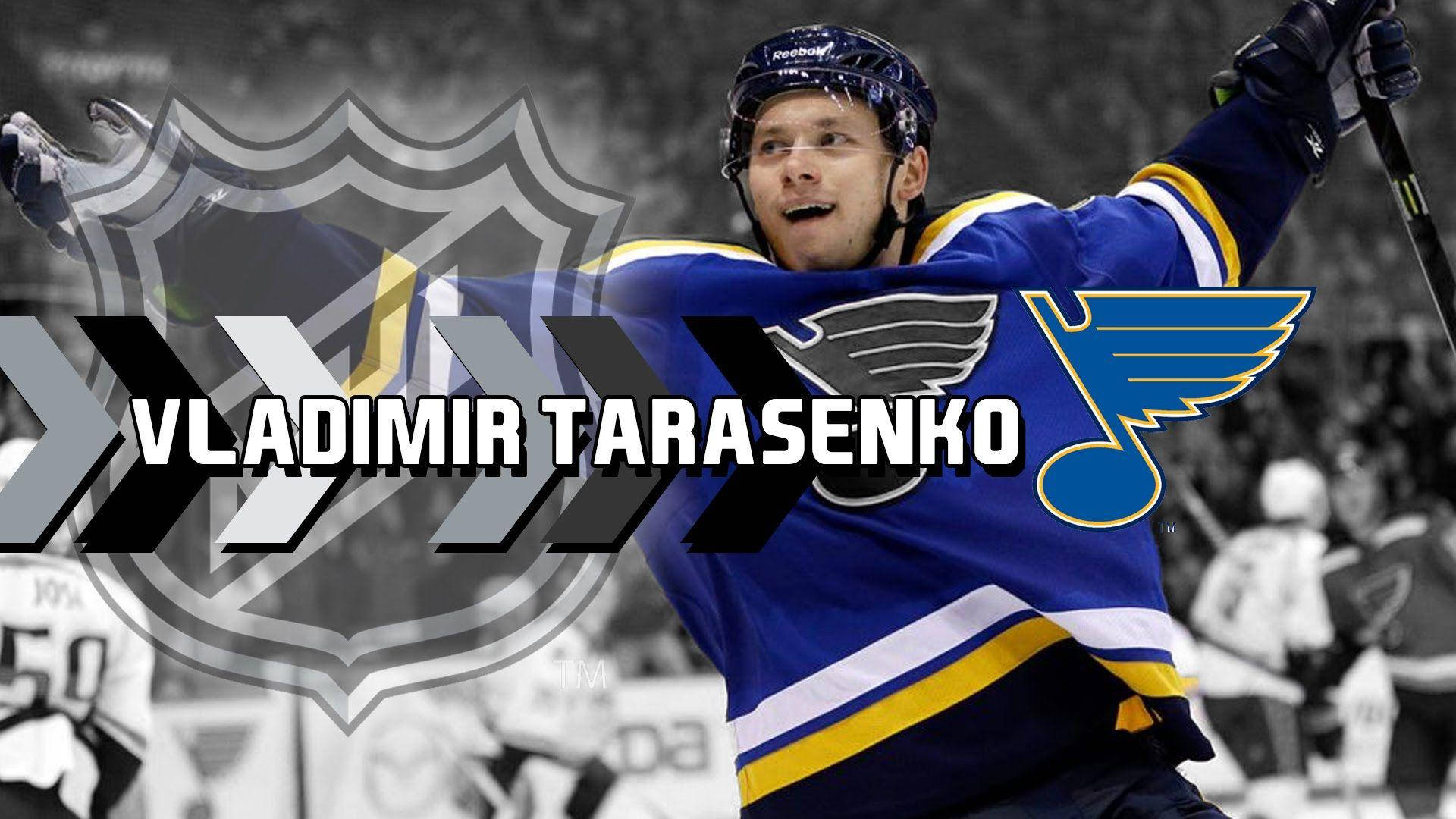 Triumph Moment Of Vladimir Tarasenko - Celebratory Gesture With Nhl Badge Background