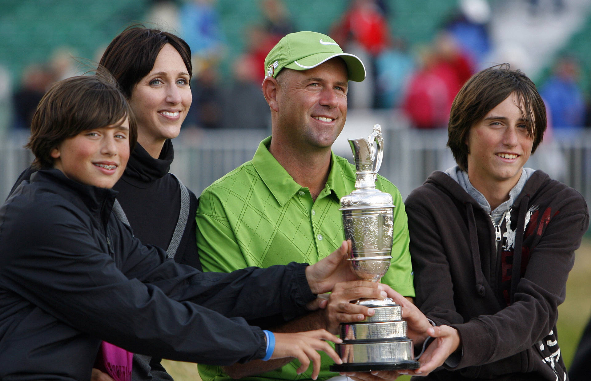 Triumph Of Family Support – Stewart Cink With Family Flaunting Award