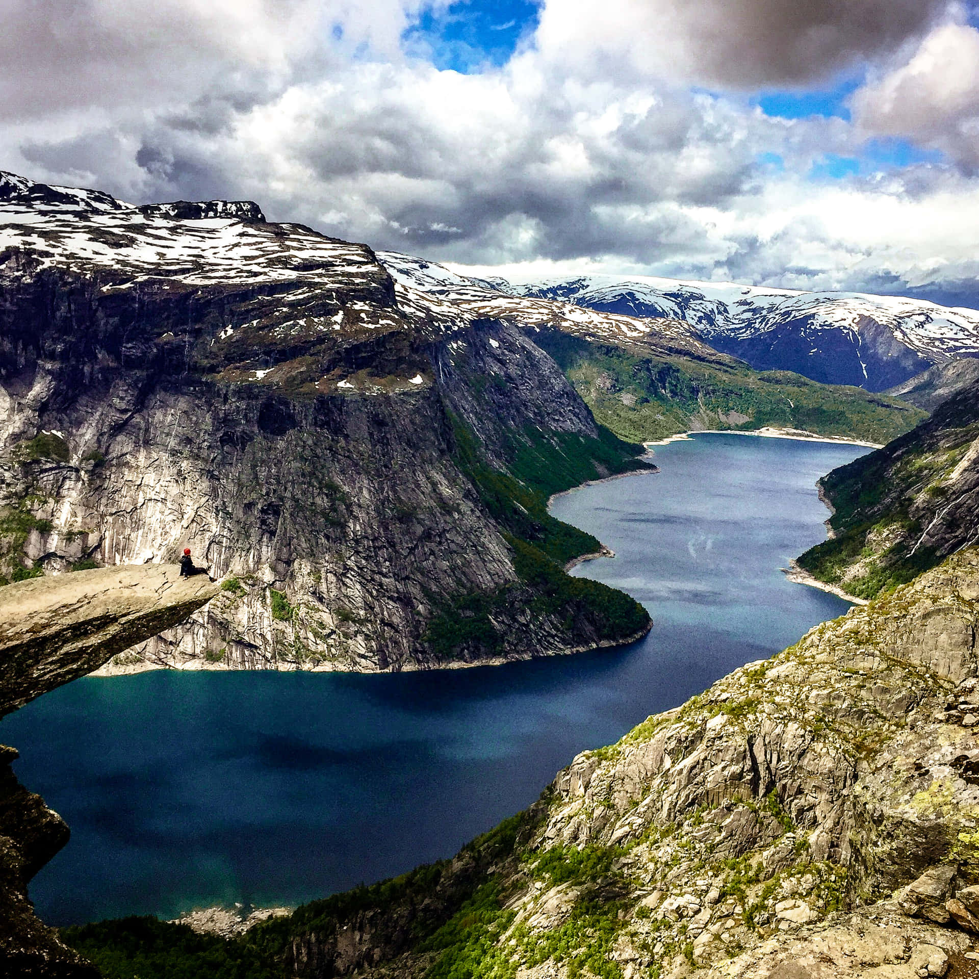 Trolltunga And Scenic Rock Formations Background