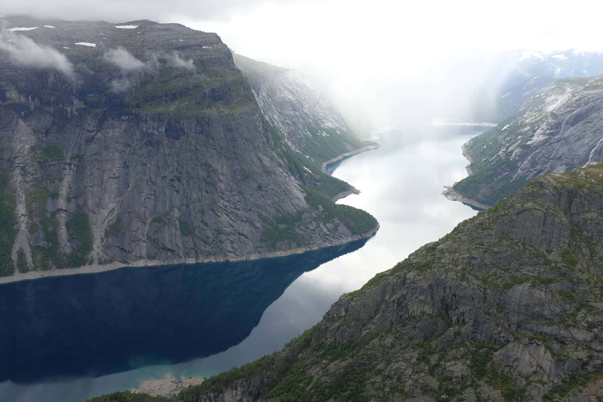 Trolltunga With Thick White Fog Background