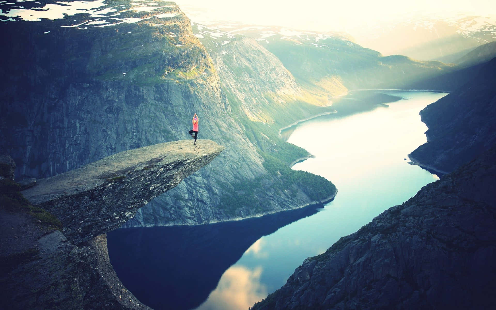 Trolltunga With Woman Doing Yoga Background