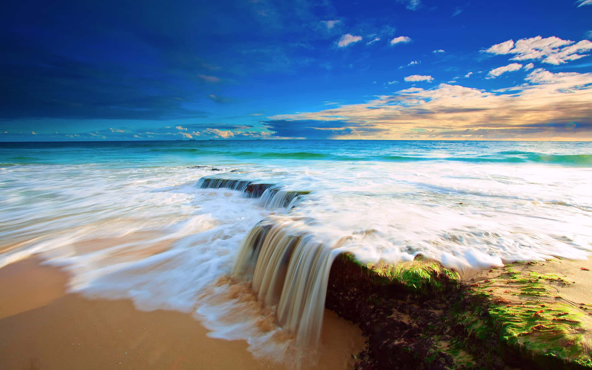 Tropical Beach Paradise With Waterfall Background