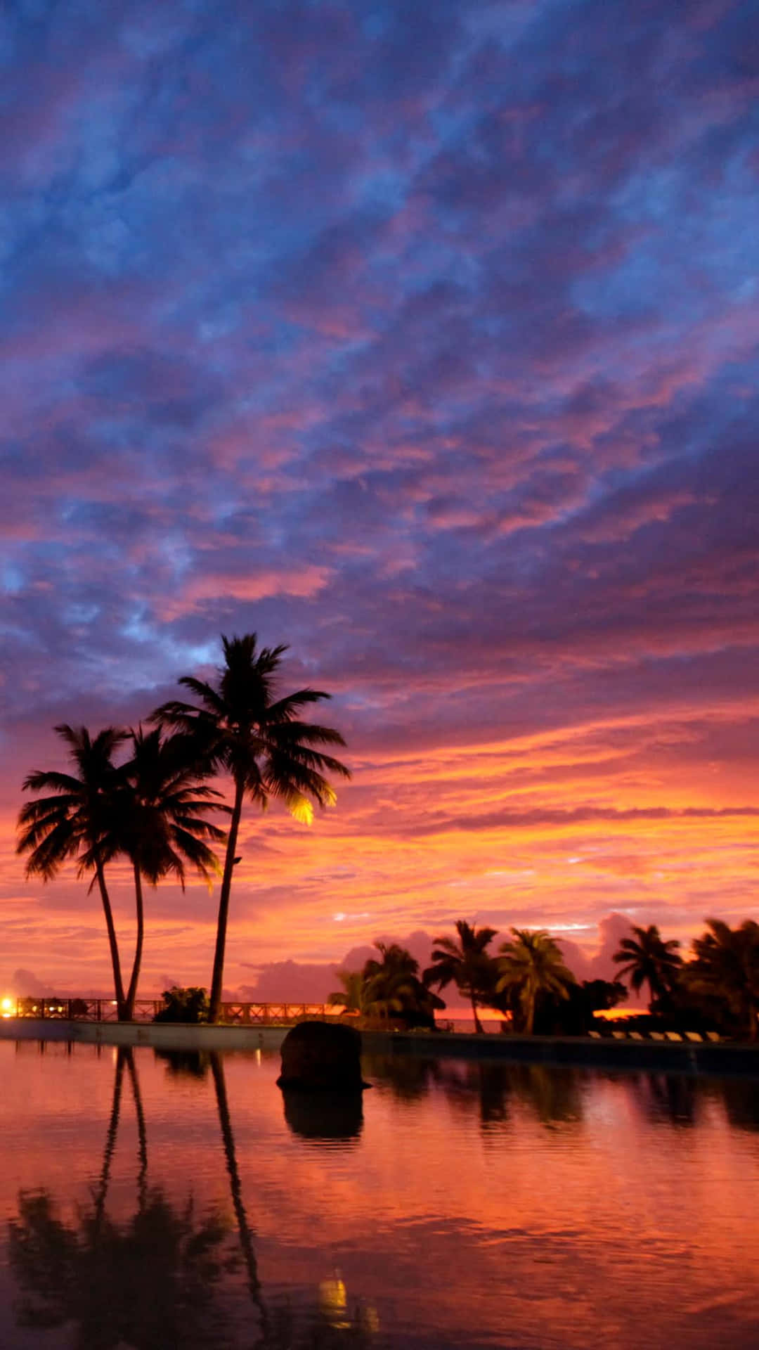 Tropical Sunset Pool Reflection Background