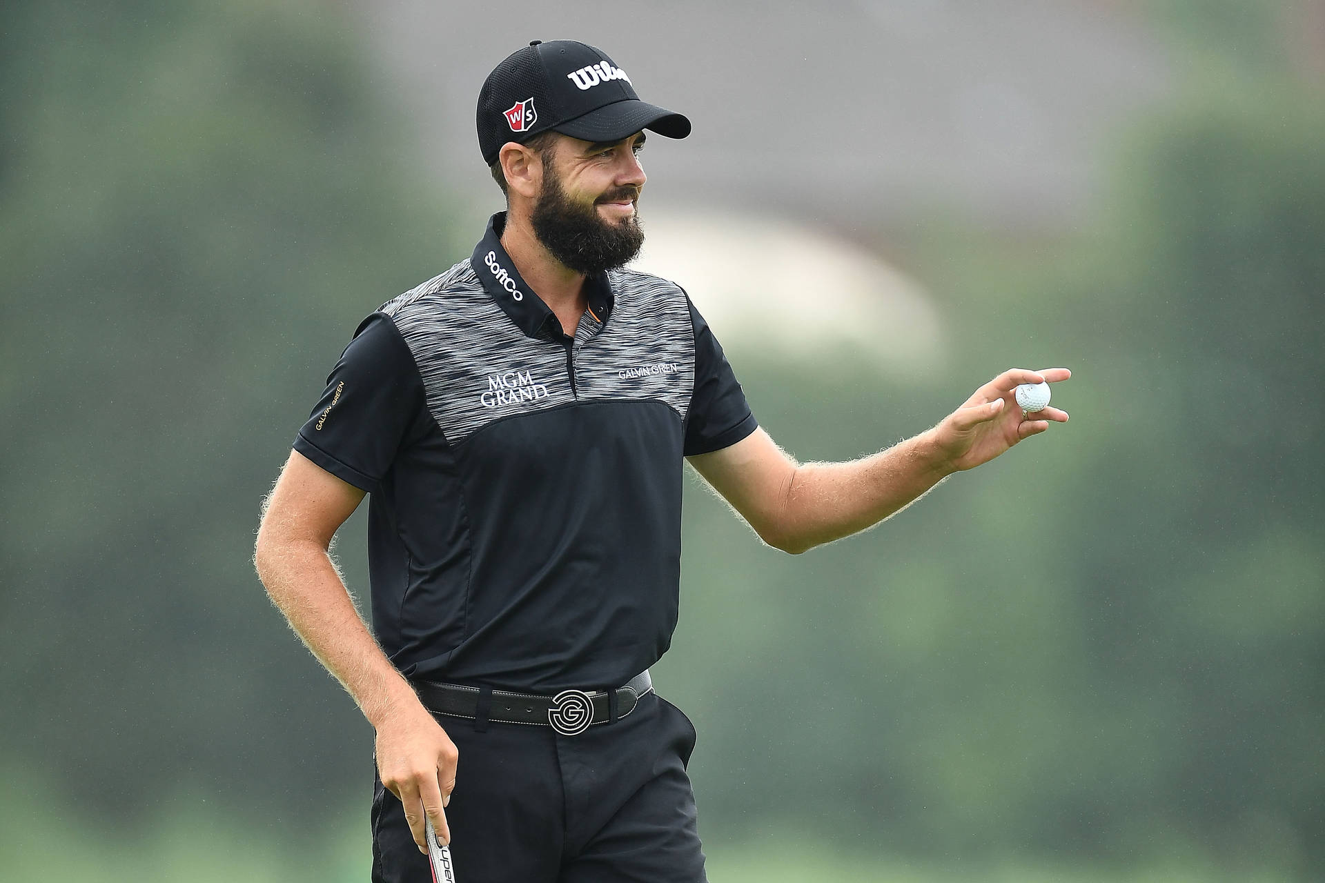 Troy Merritt Holding Out Golf Ball