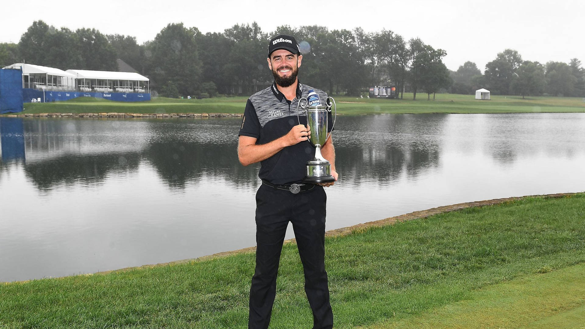 Troy Merritt Posing With Trophy Background