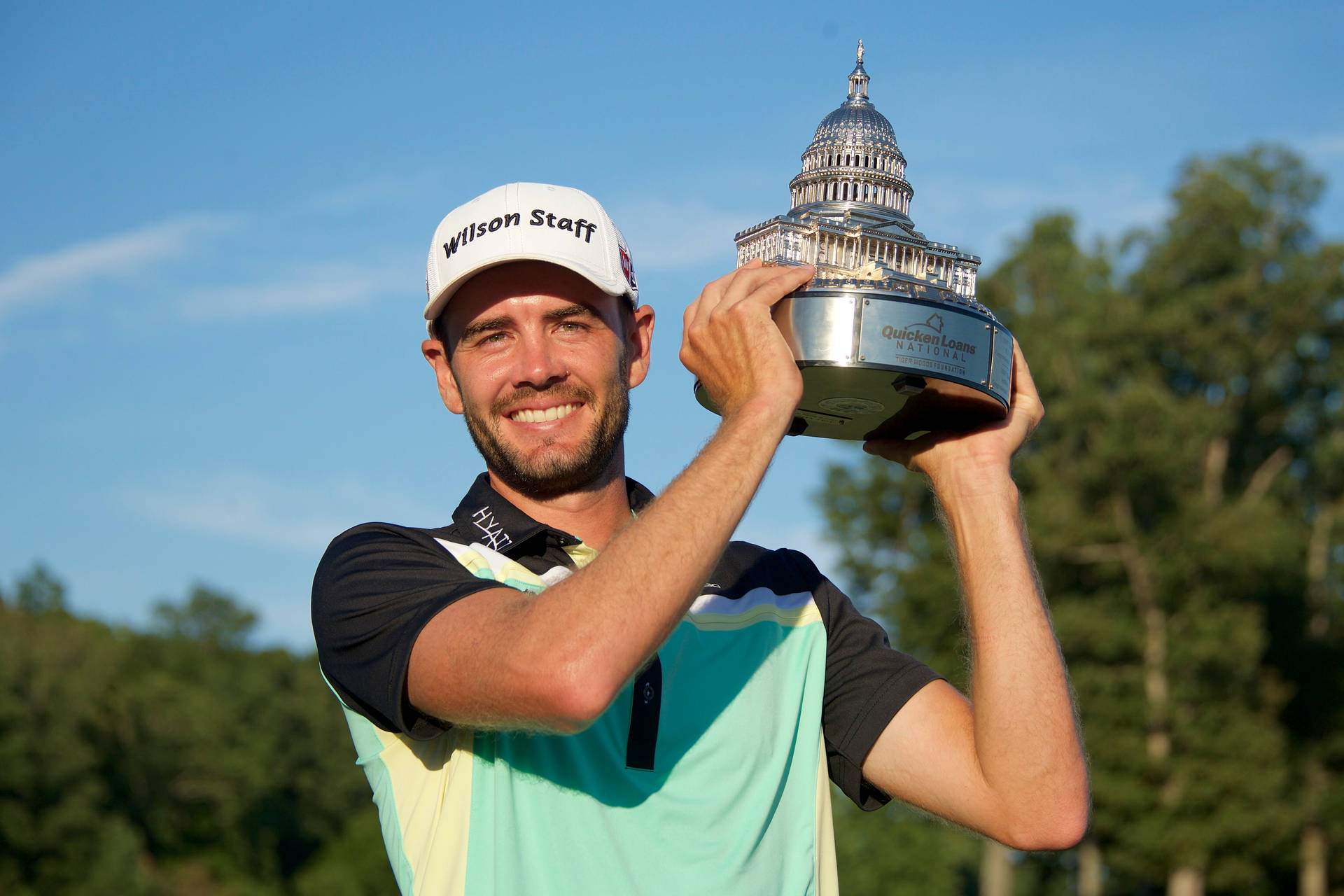 Troy Merritt Smiling And Holding Trophy Background