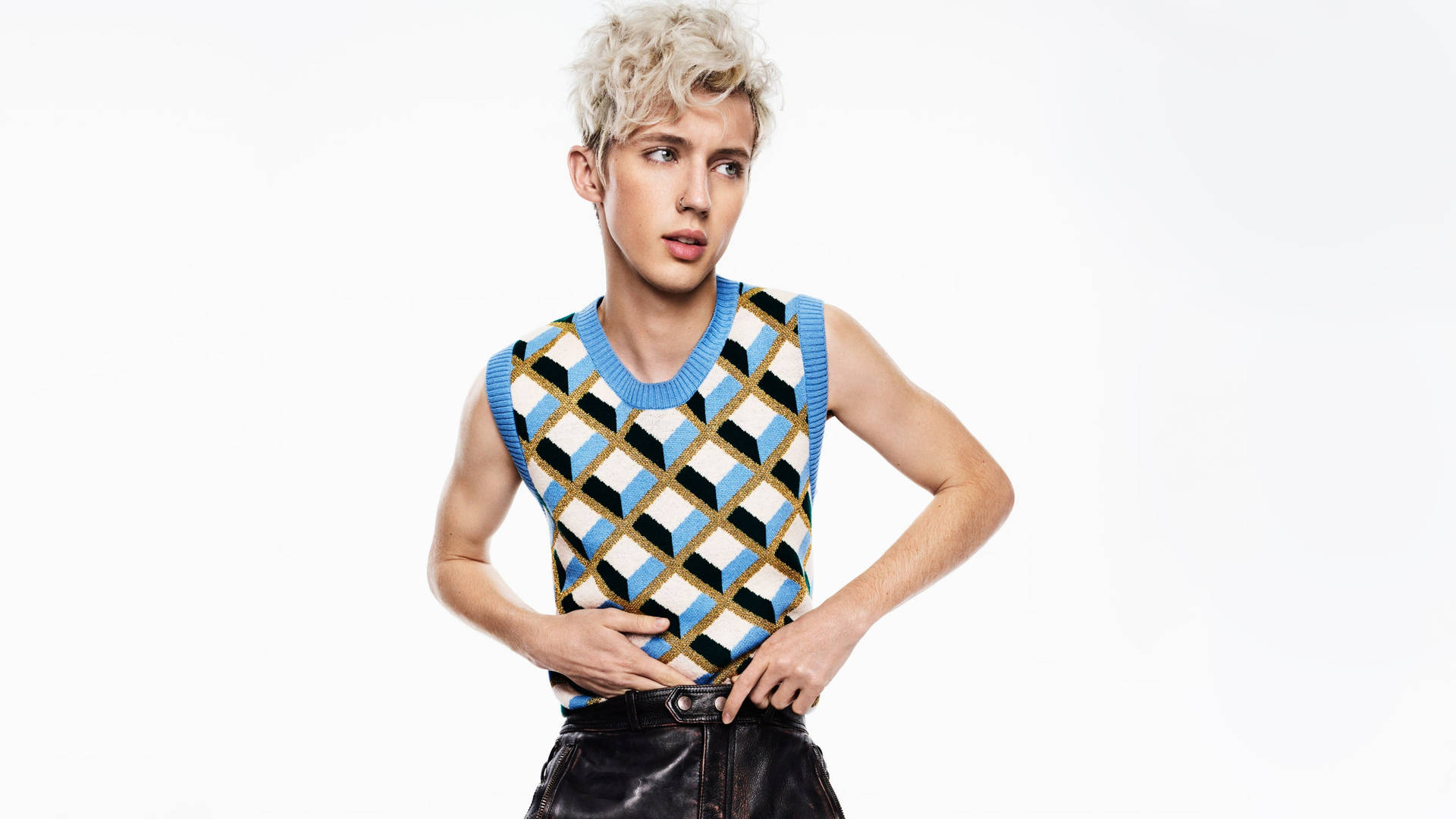 Troye Sivan Sporting A Stylish Blue Retro Outfit.