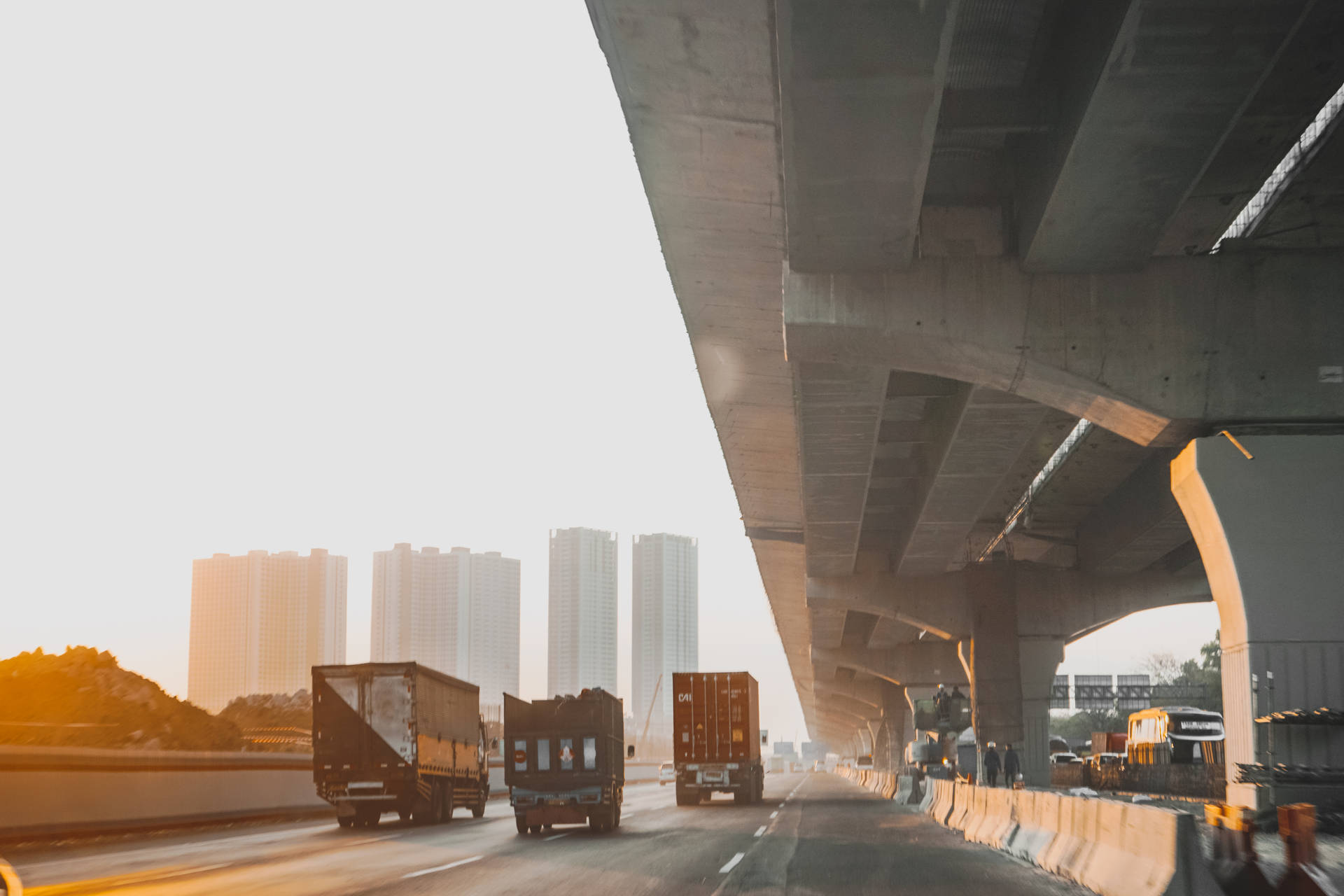 Trucks Highway Near Jakarta Metropolis Background