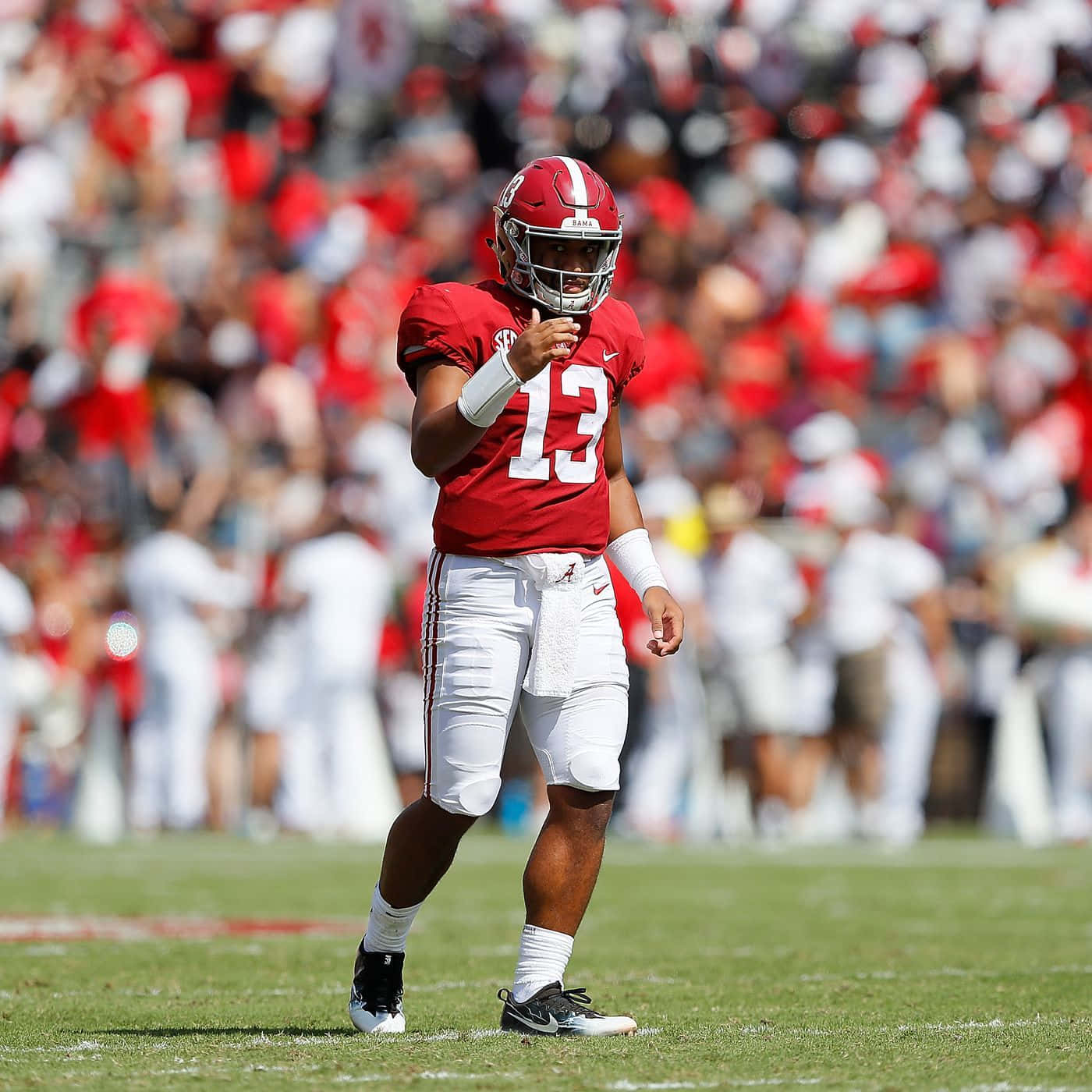 Tua Tagovailoa In Red Background