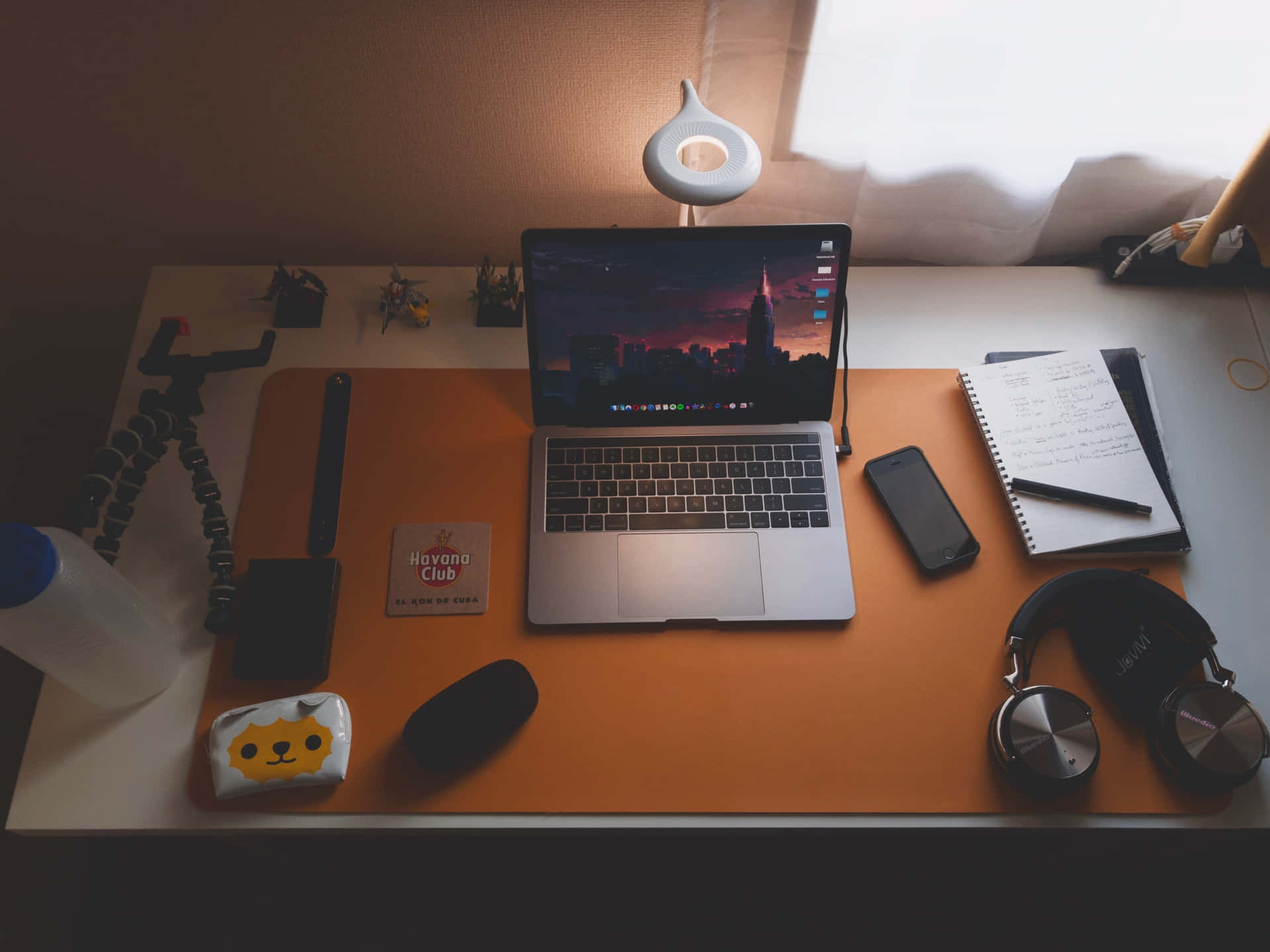 Tune In To Your Favorite Music Or Podcasts On Your Laptop Background