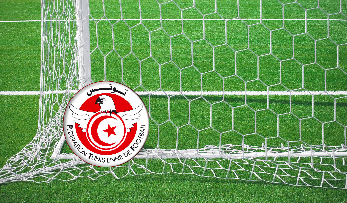 Tunisia National Football Team Logo In Goal Post Background