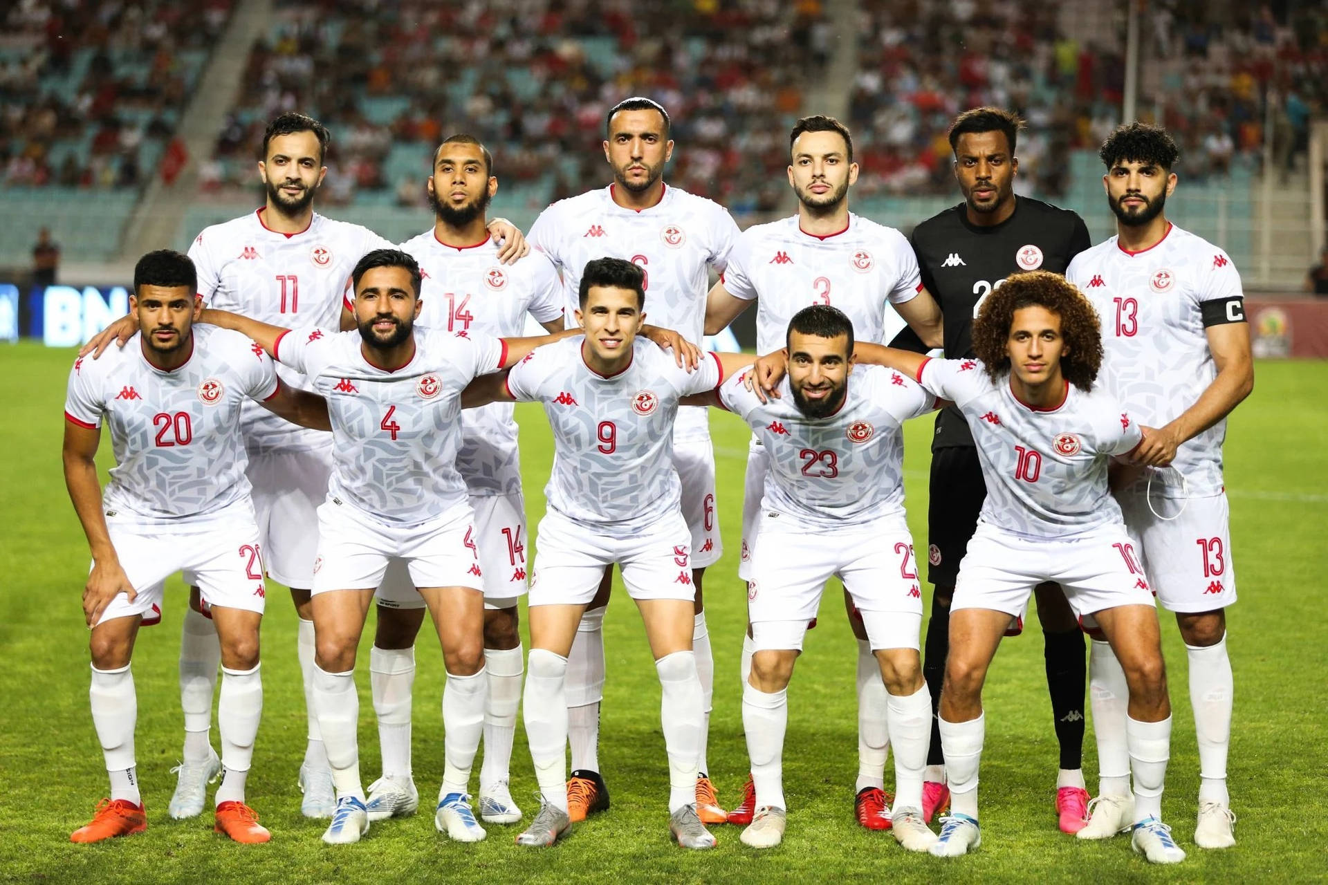 Tunisia National Football Team Players In White Jersey Background