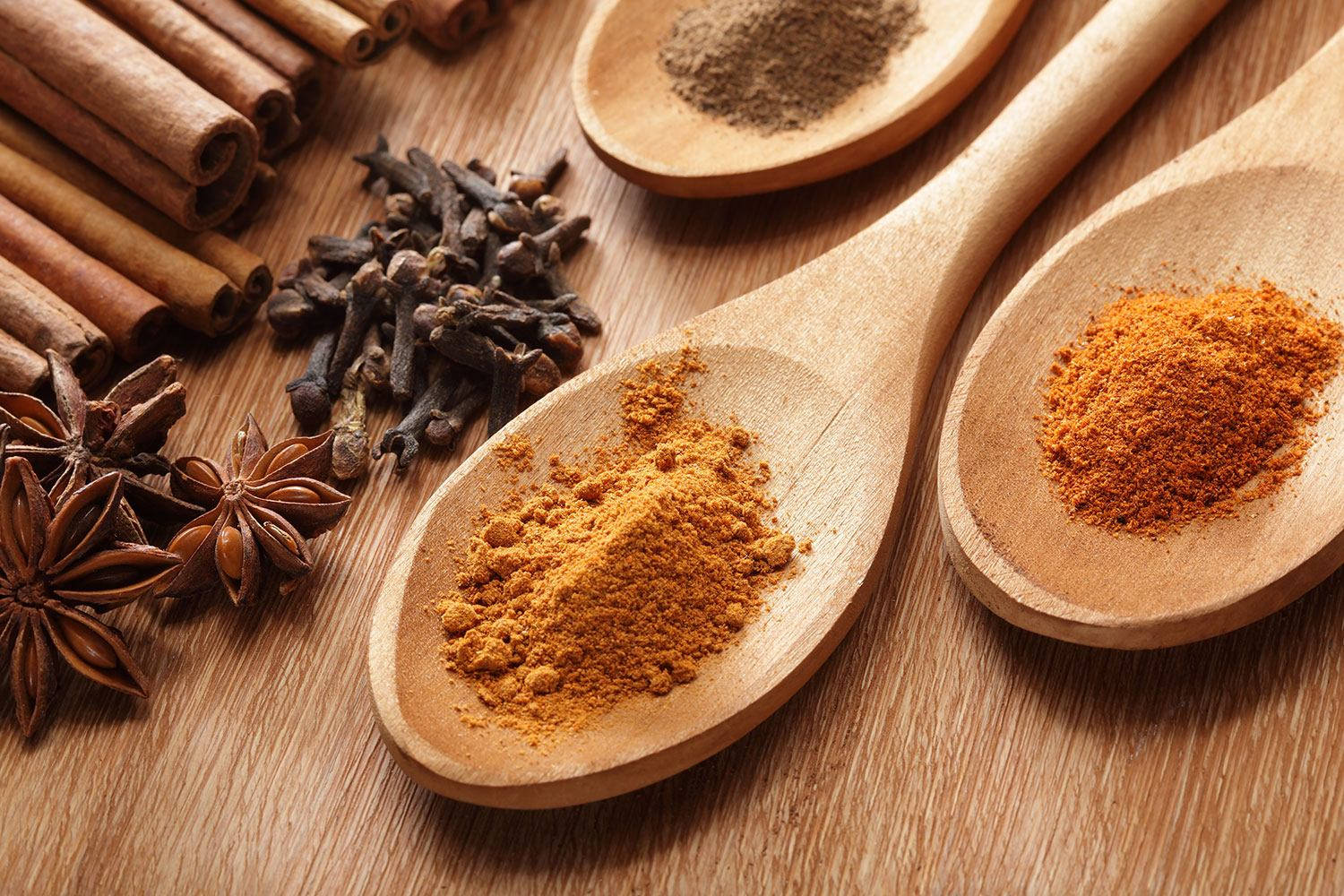 Turmeric Powder And Other Spices Background