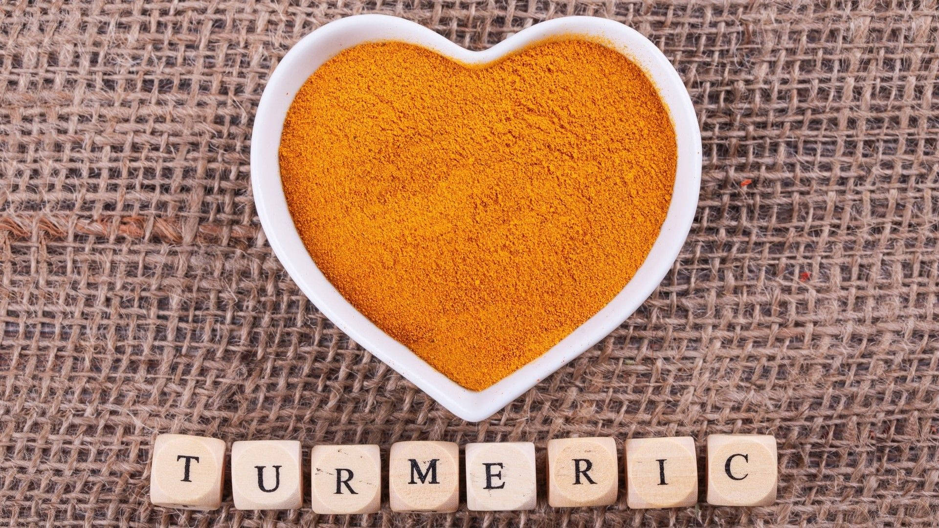 Turmeric Powder In Heart-shaped Bowl