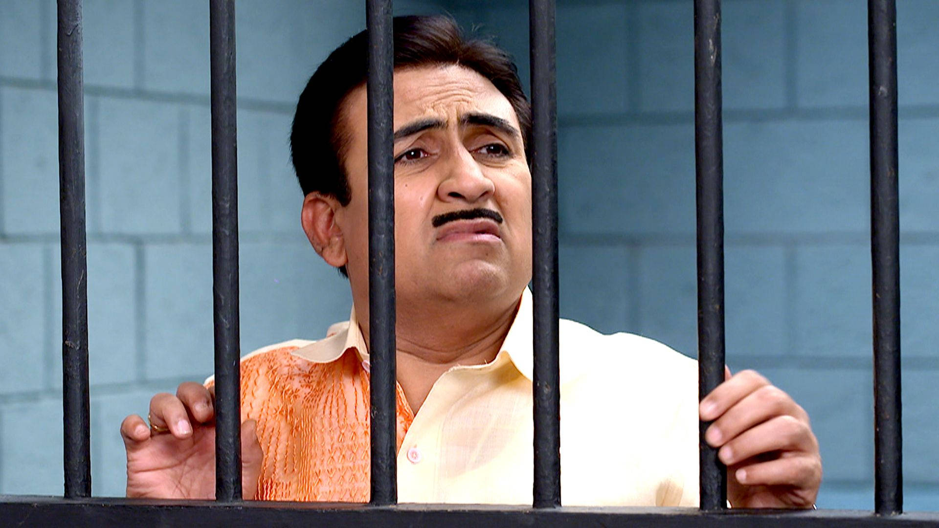 Tv Actor Dilip Joshi As Jethalal Behind Prison Bars Background