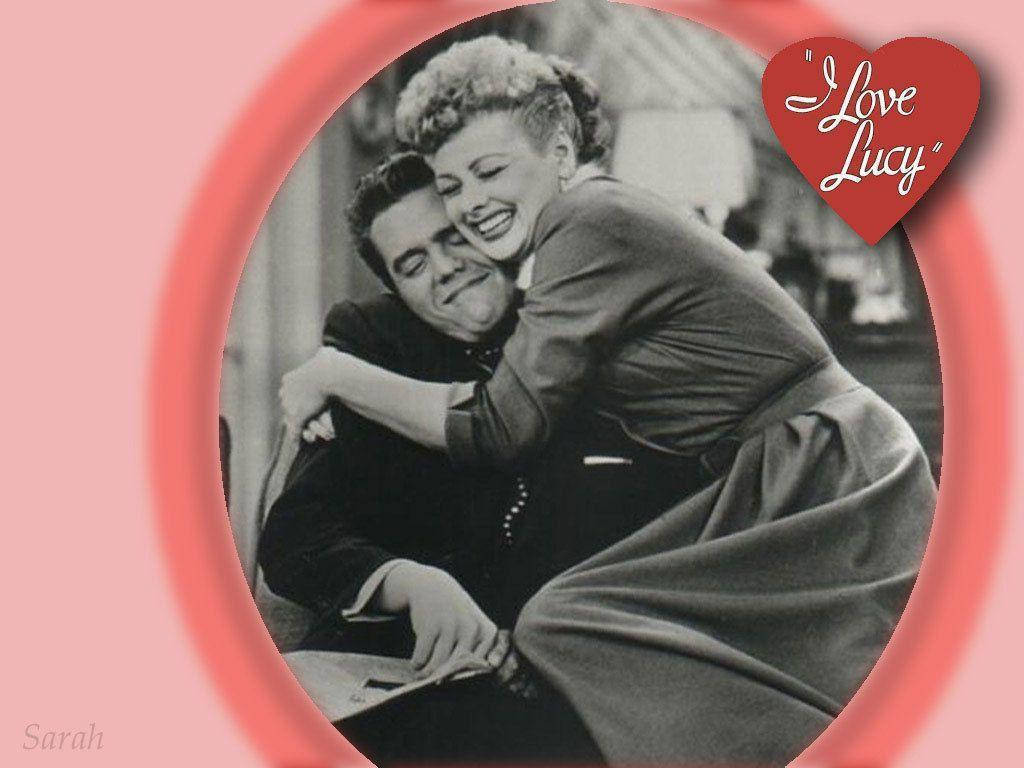 Tv Icons Lucille Ball And Desi Arnaz Share A Loving Embrace Background