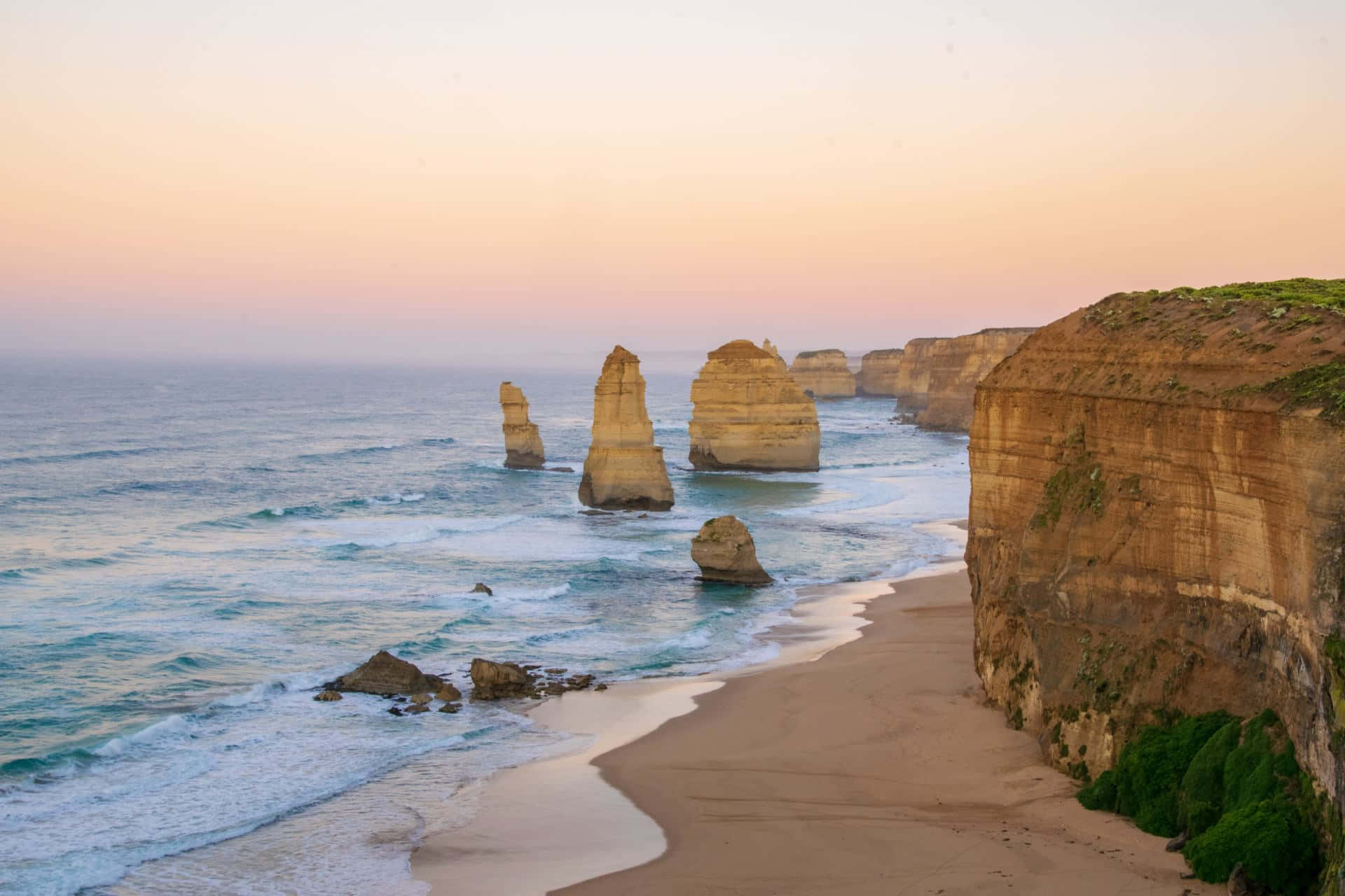 Twelve Apostles In Great Ocean Road Australia During Nightfall Background