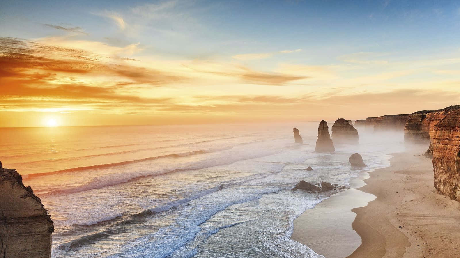 Twelve Apostles In Victoria Australia During Golden Hour Background